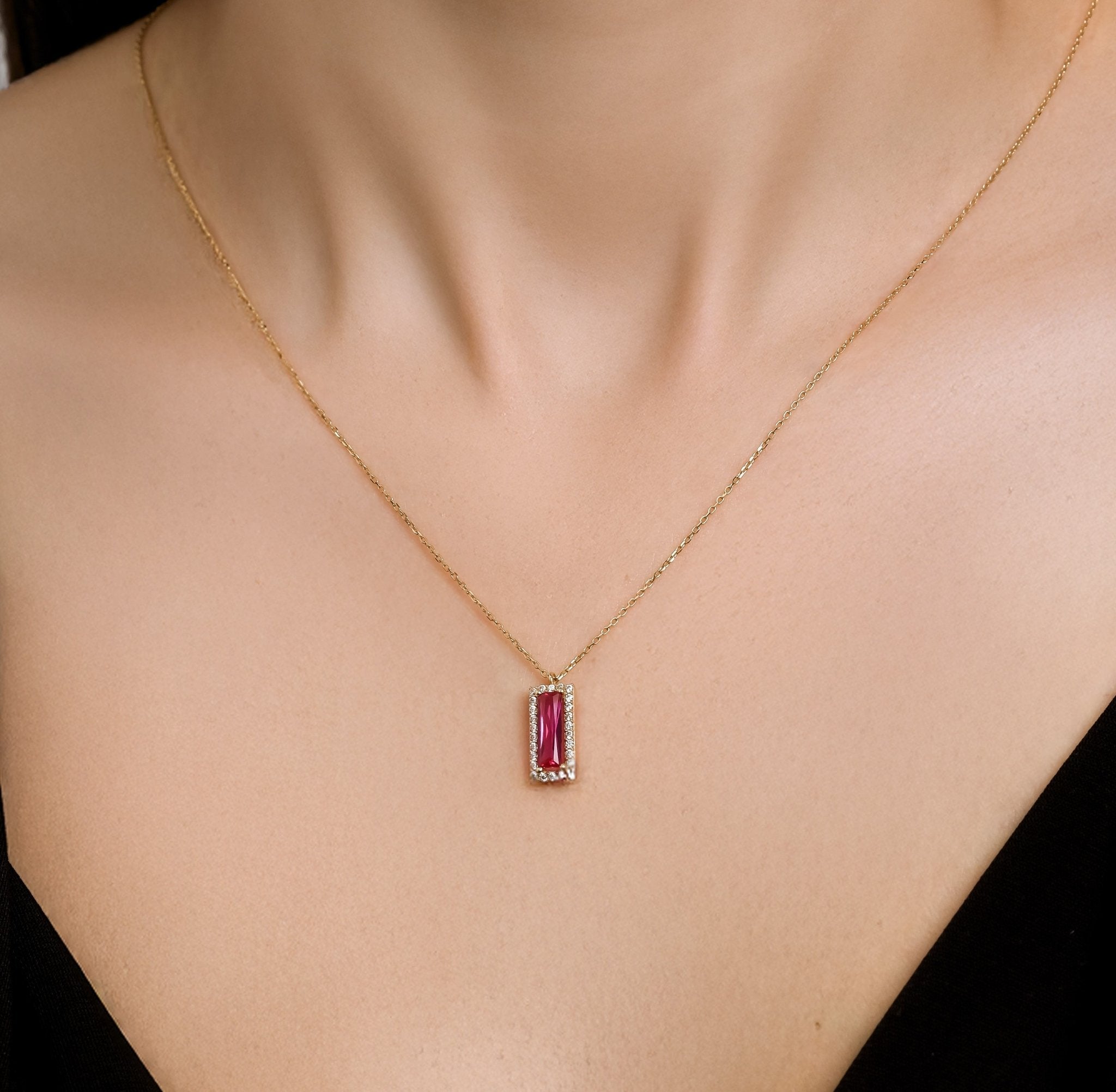 14K solid yellow gold necklace featuring a baguette ruby pendant with cubic zirconia, elegant and minimalist design.
