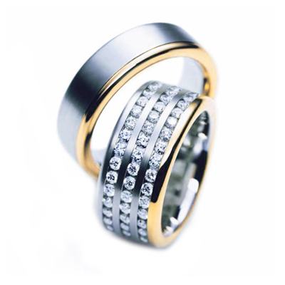 Juego de alianzas de boda con diamantes para él y para ella