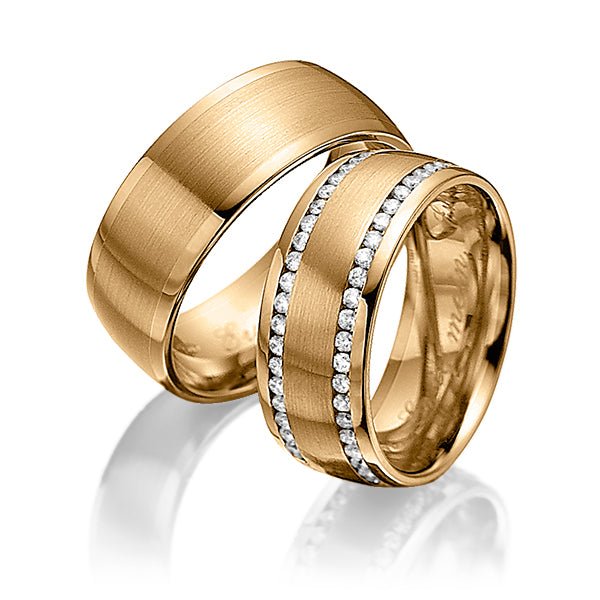 His and hers diamond wedding bands in gold with satin and shiny finishes, featuring round brilliant cut diamonds.
