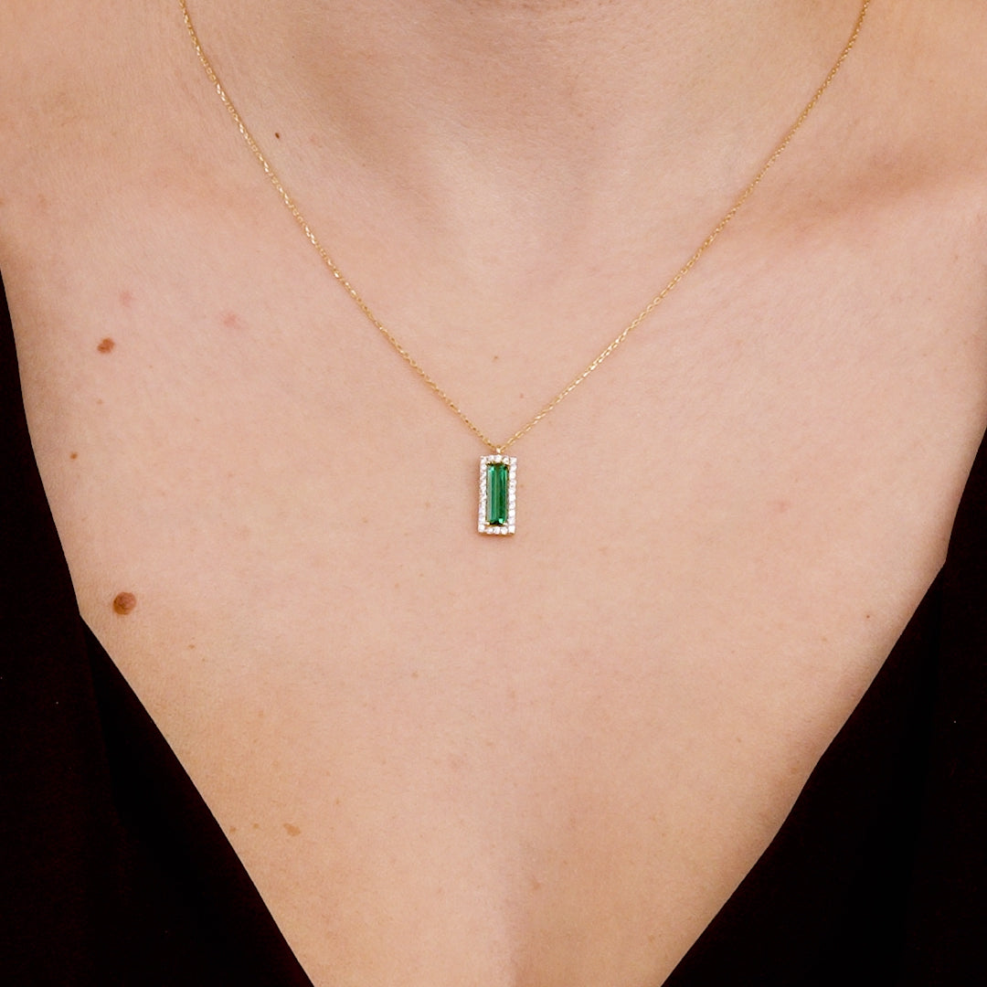 Dainty 14K solid yellow gold necklace with baguette emerald pendant, perfect for everyday wear.