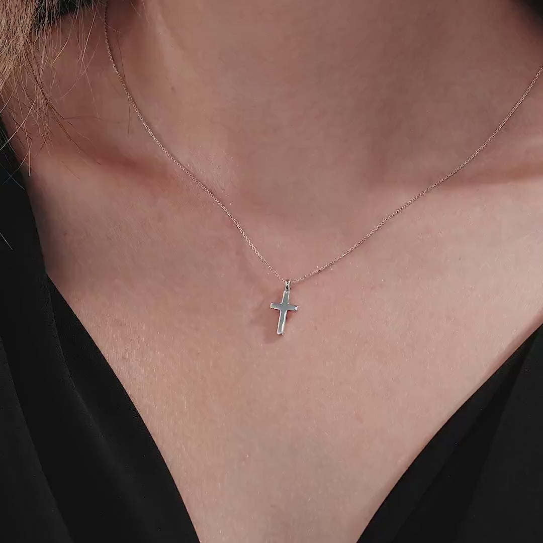 14K solid white gold cross necklace worn on neck, minimalist design for everyday elegance.