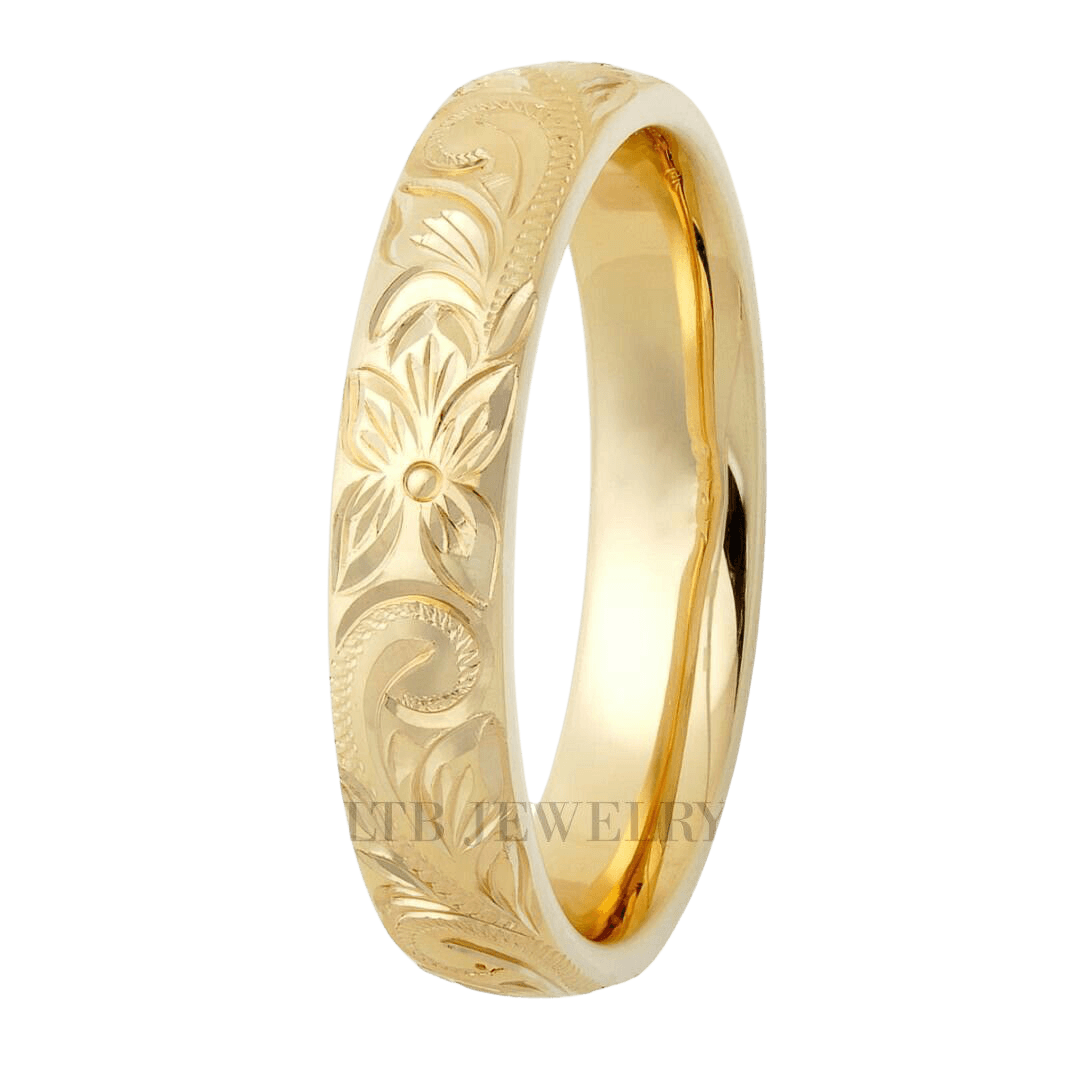 Elegant hand engraved gold wedding band with floral motifs, 4mm width, comfort fitted design, beautifully shiny finish.