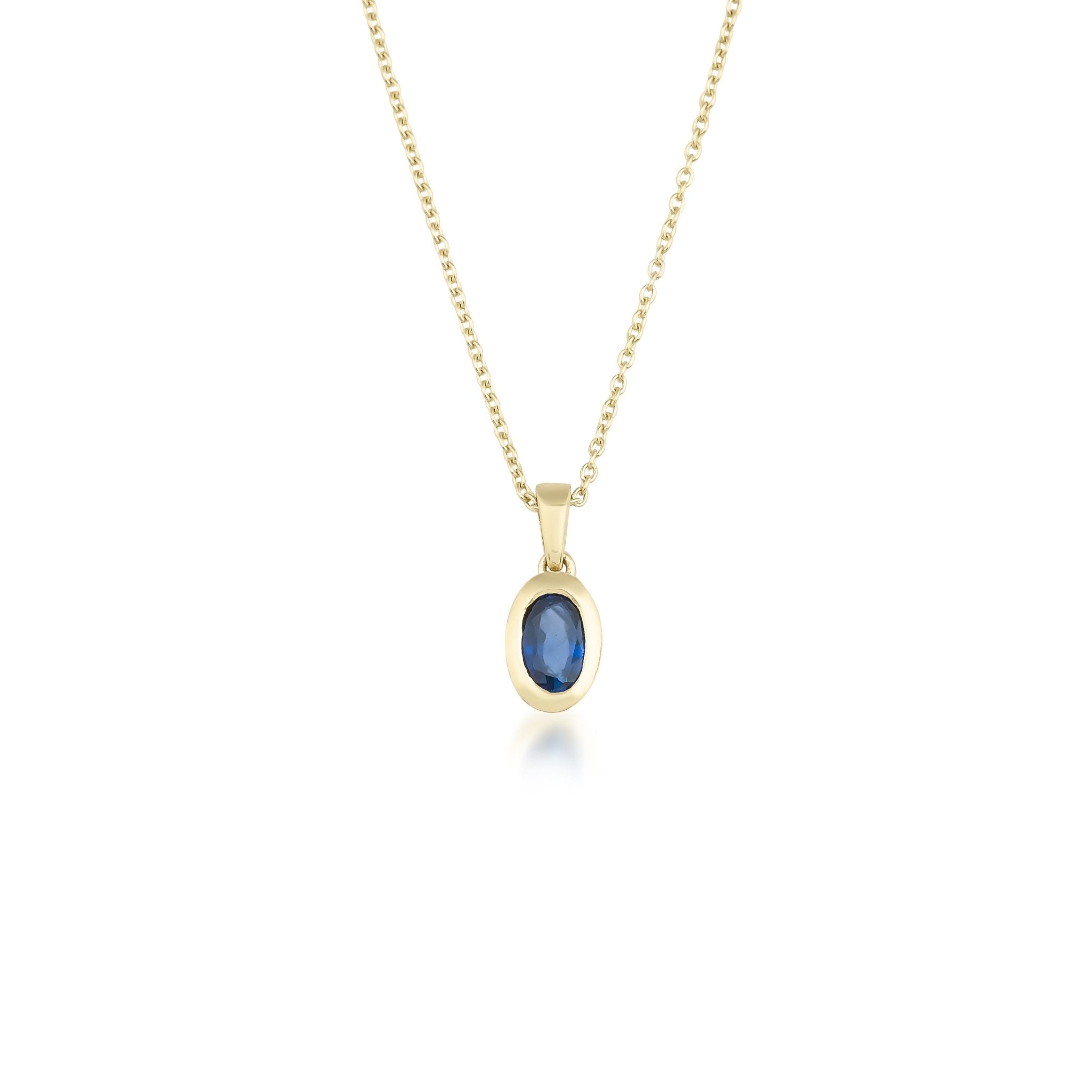 14K gold natural sapphire solitaire necklace with a delicate chain and oval pendant, perfect for everyday elegance.