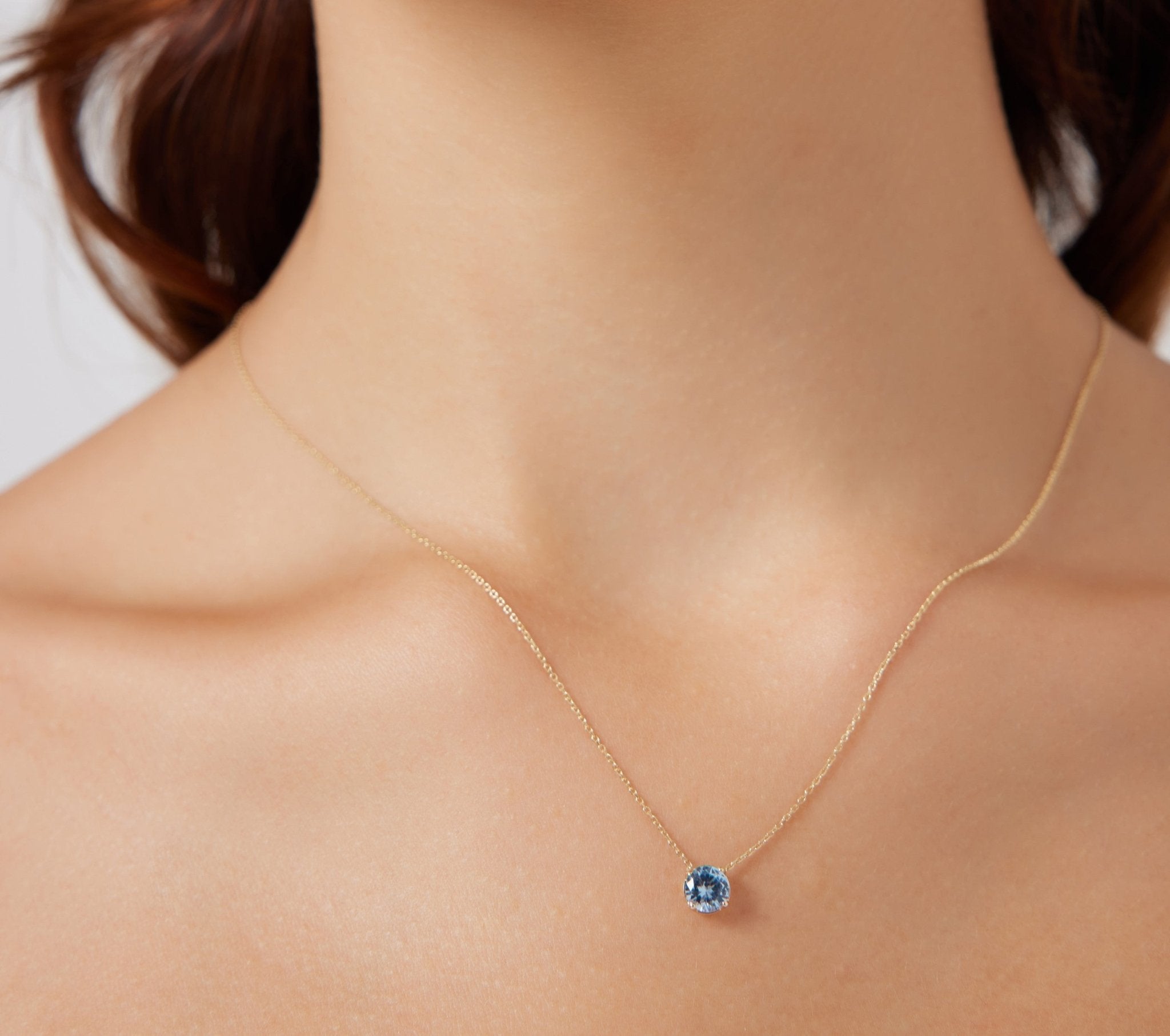 14K white gold necklace with 6mm aquamarine pendant, perfect for everyday wear and March birthstone jewelry.