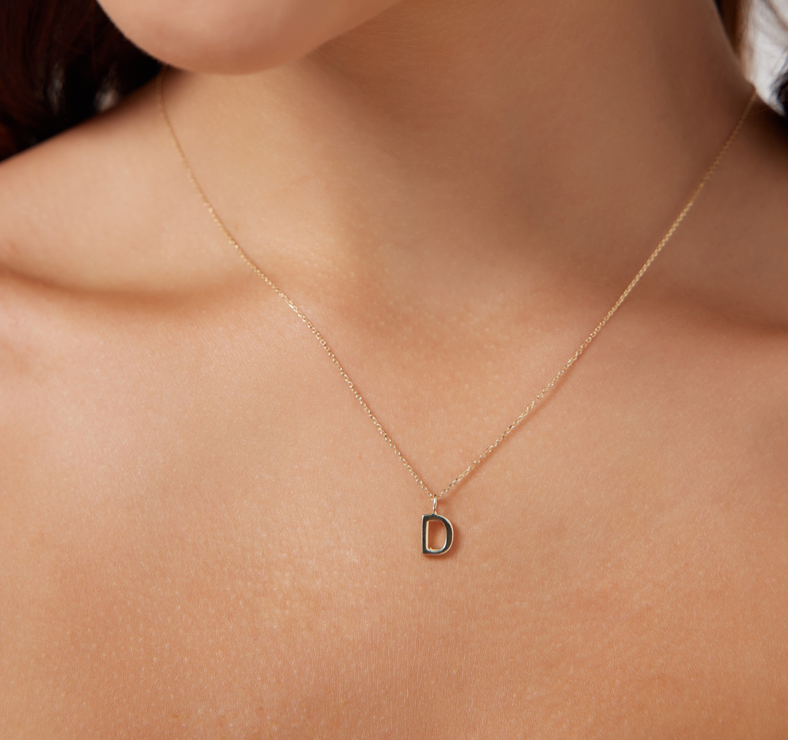 14K solid yellow gold dainty initial necklace featuring letter D, 16-inch chain, elegant and stylish accessory.
