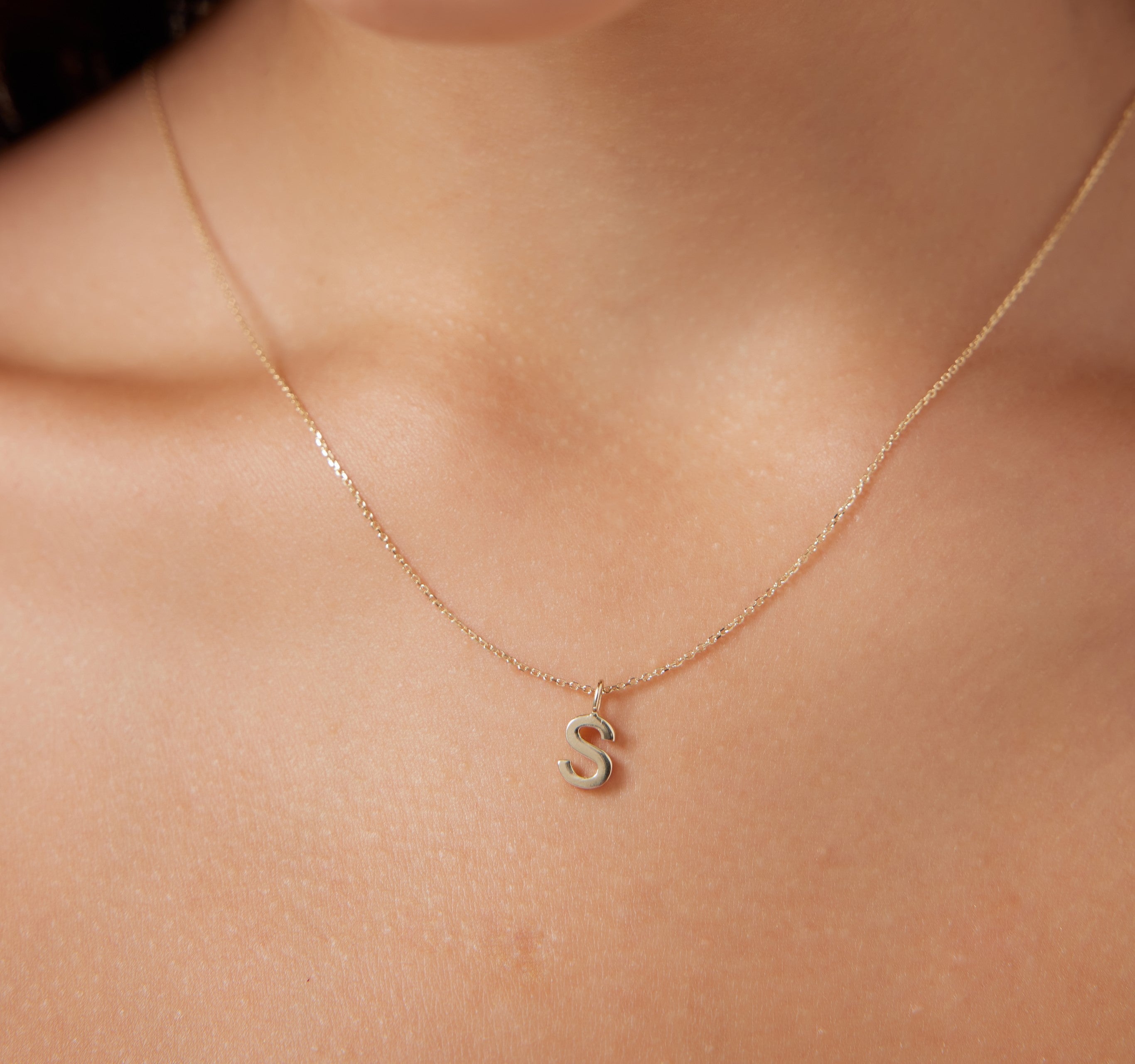 14K solid yellow gold initial necklace featuring letter S, 16-inch dainty design, perfect gift for any occasion.