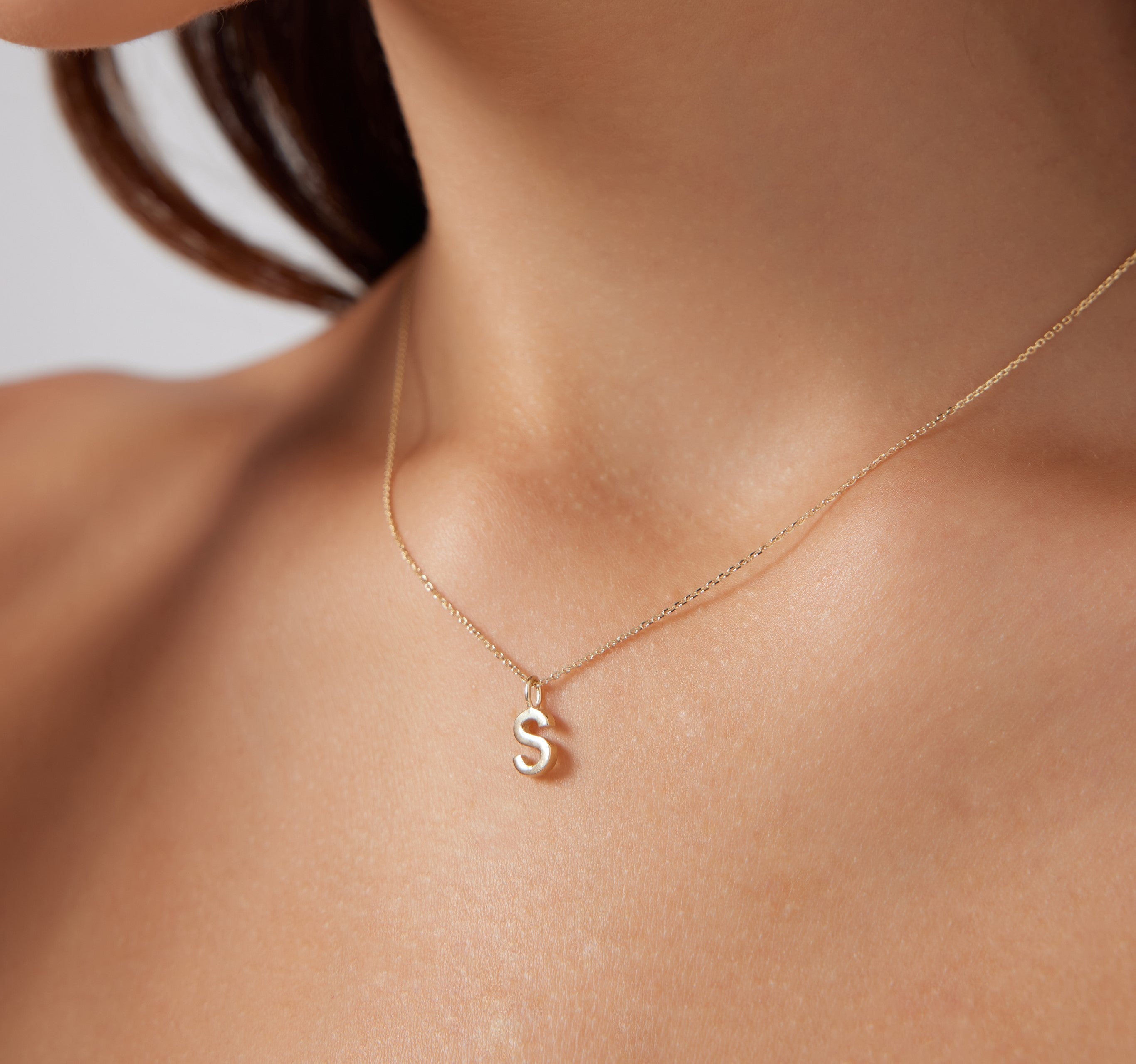 14K solid yellow gold initial necklace featuring a dainty letter S pendant, perfect for personalized jewelry lovers.