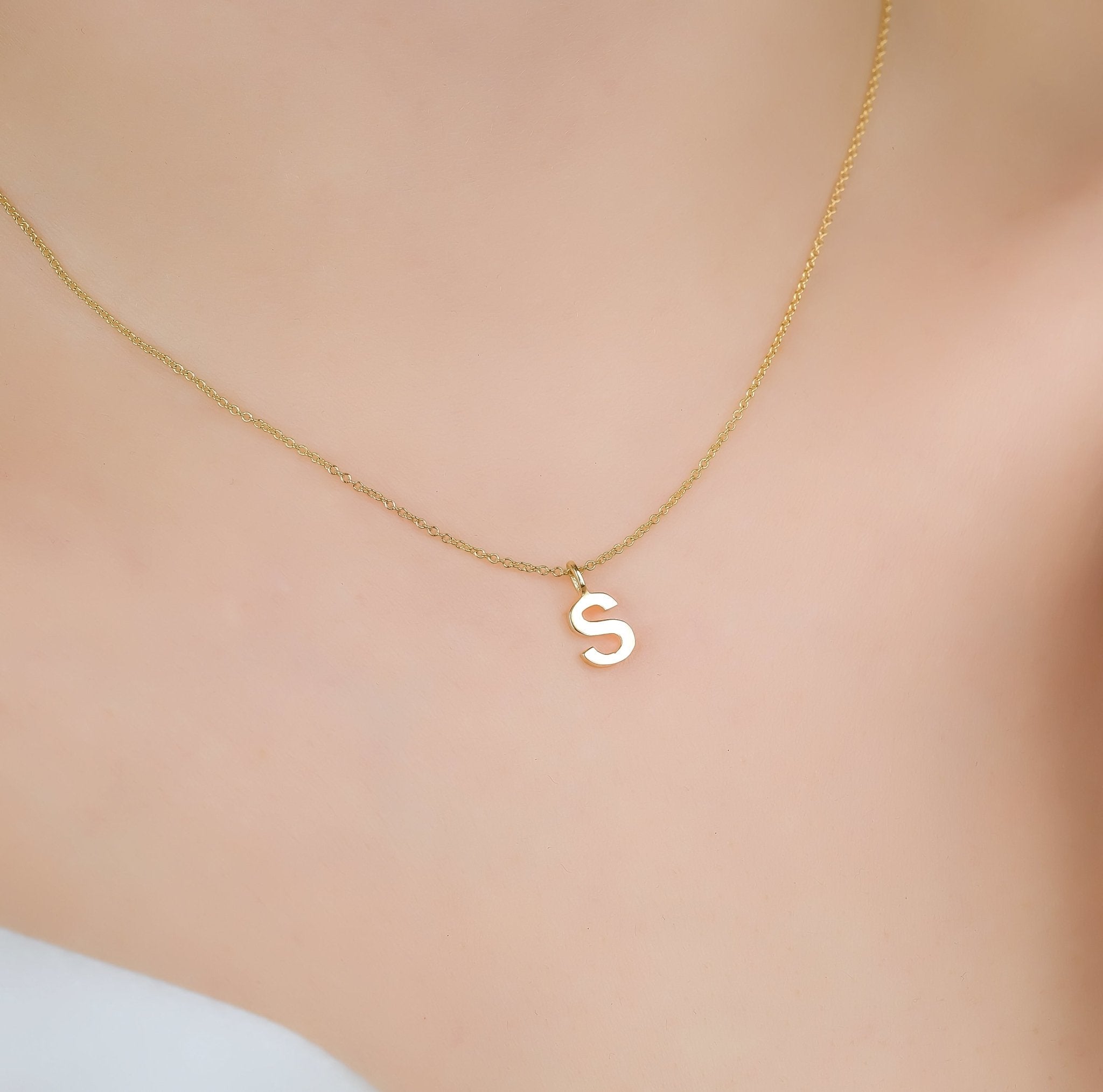14K solid yellow gold initial necklace featuring letter S, 16-inch chain, dainty design, perfect gift for personalized jewelry.