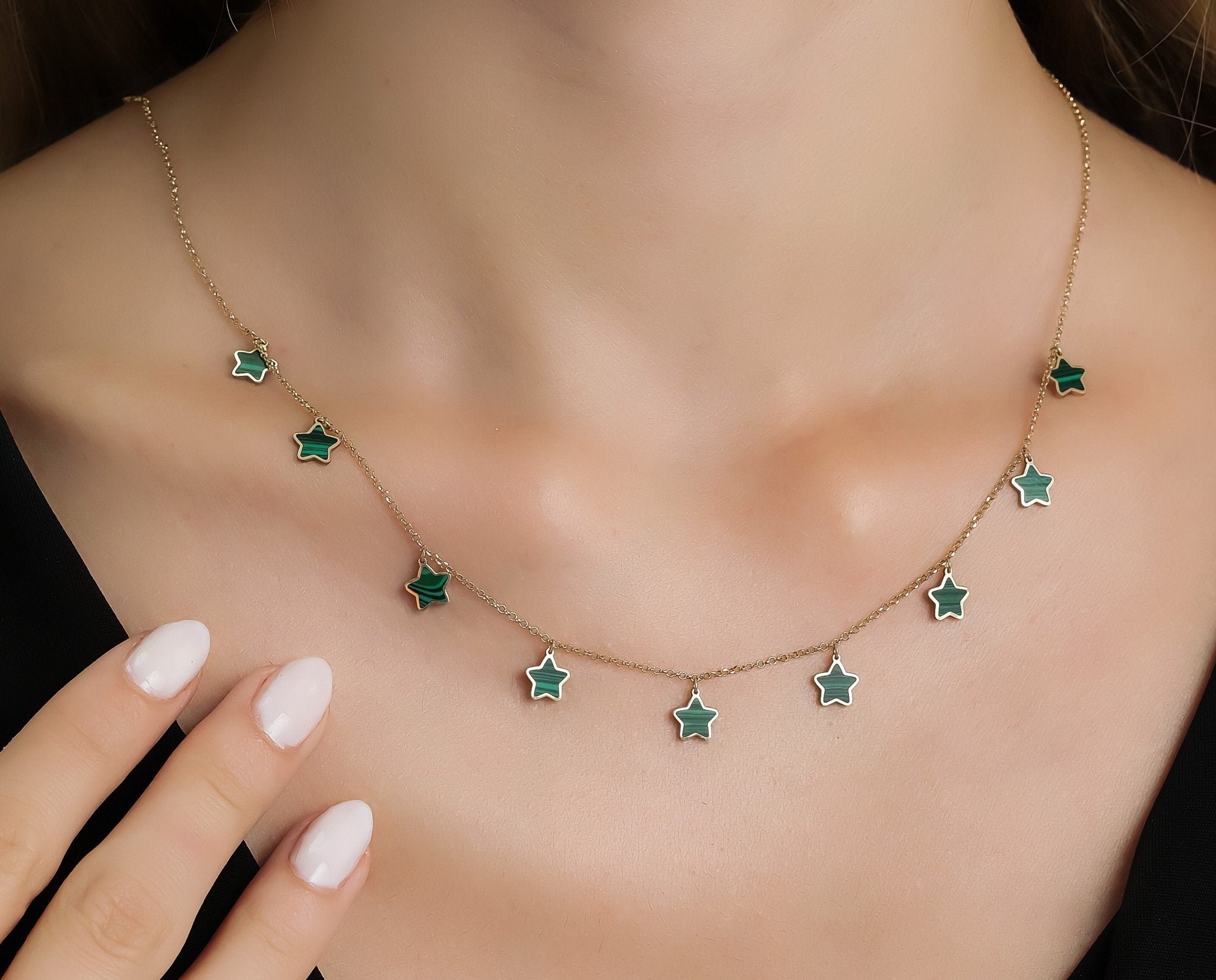14K solid yellow gold malachite star necklace worn, showcasing green stars and delicate chain, perfect gift option.
