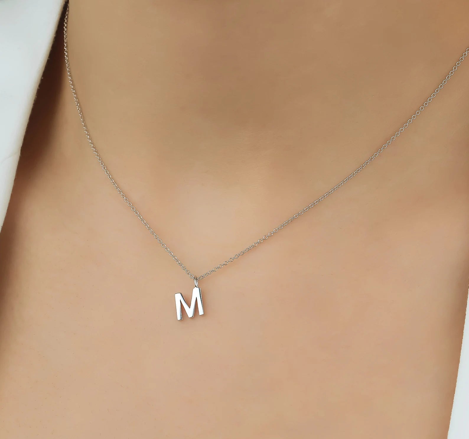 14K solid gold dainty initial necklace with letter M, 16 inches in length, showcasing elegant jewelry design.