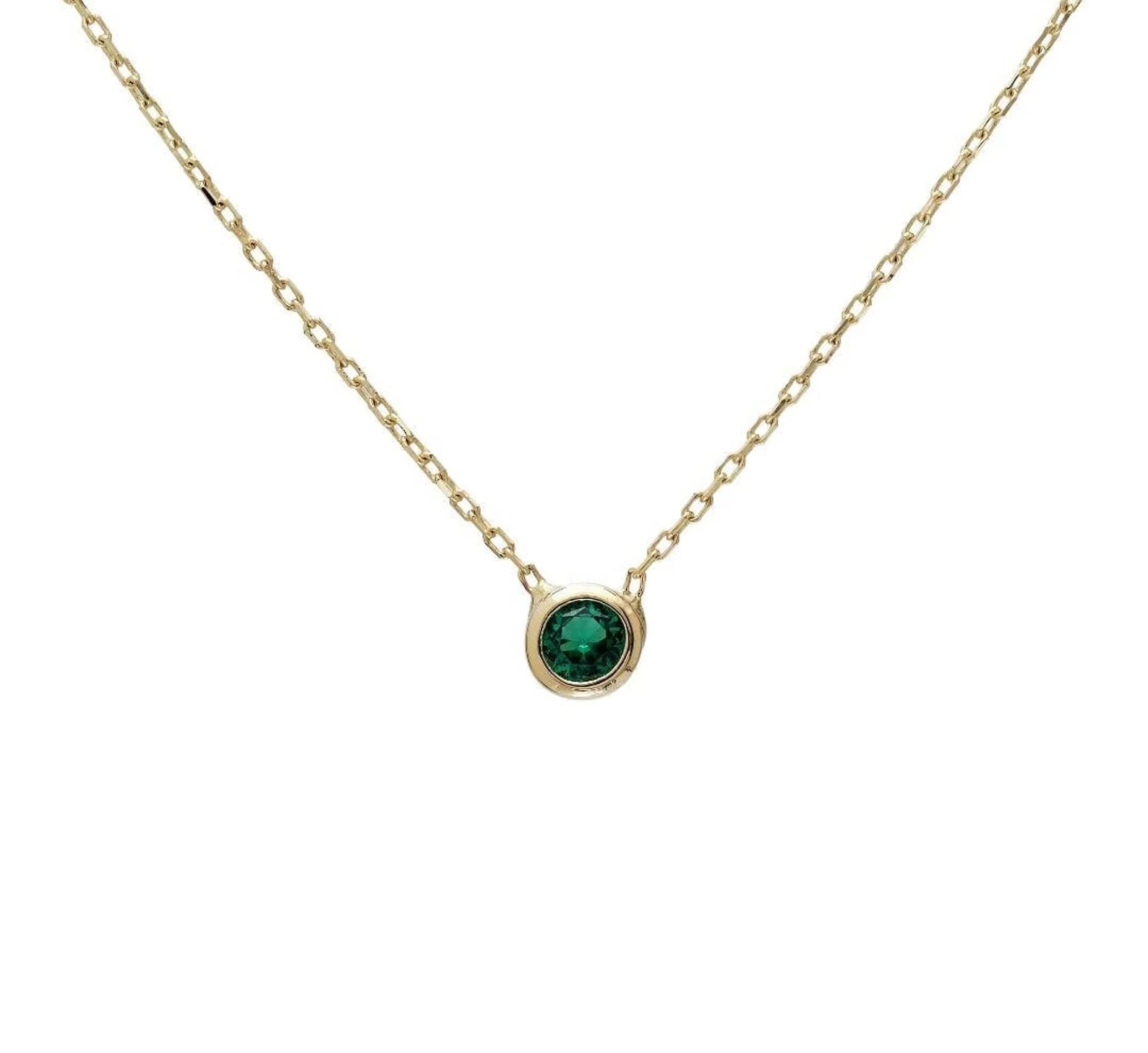 14K solid yellow gold necklace featuring a 4mm solitaire emerald pendant, perfect for everyday elegance.