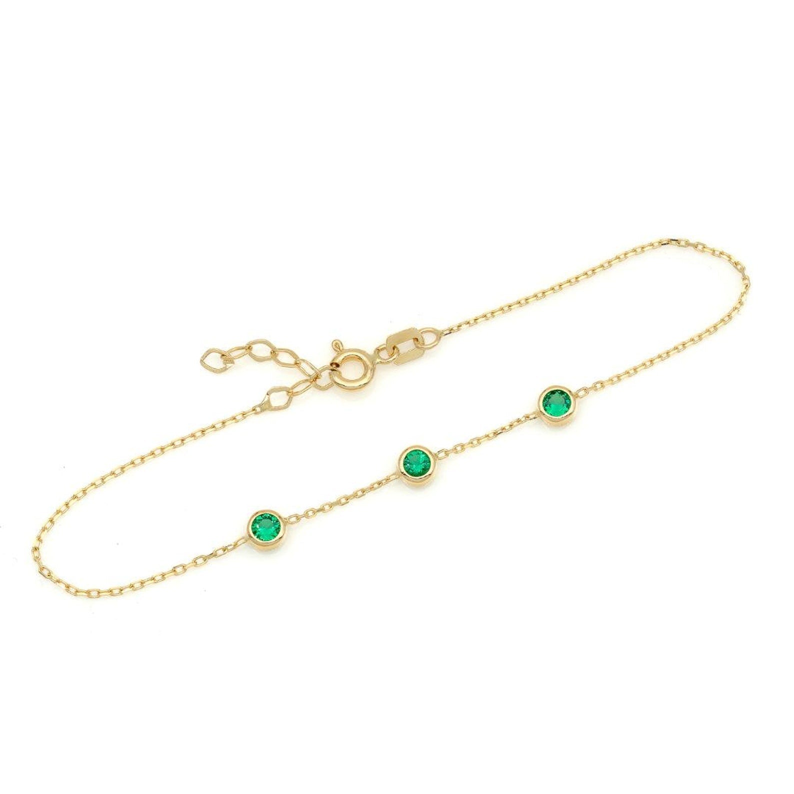 14K solid yellow gold bracelet with three lab-created emerald stations, minimalist design, 7 inches long.