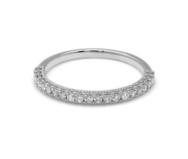 14K gold half eternity diamond wedding ring featuring 27 round diamonds set in a shiny finish.