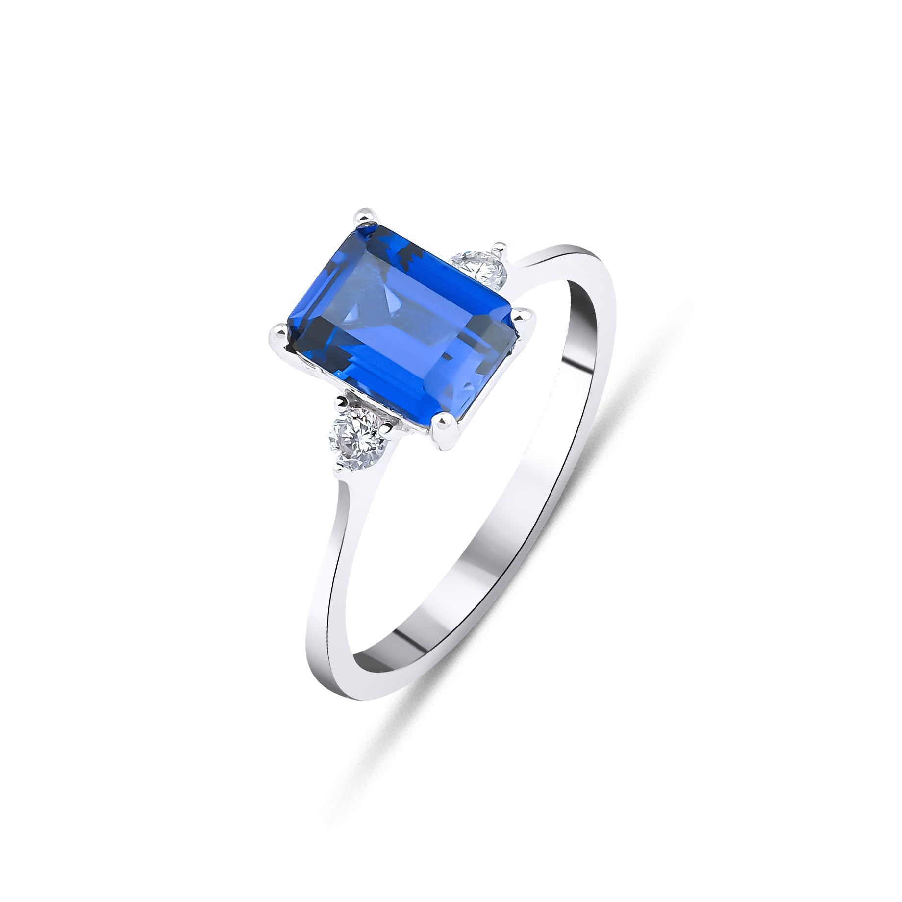 14K white gold emerald cut sapphire ring with diamond accents, showcasing a 1.75 carat quartz sapphire and 0.08 carat diamonds.