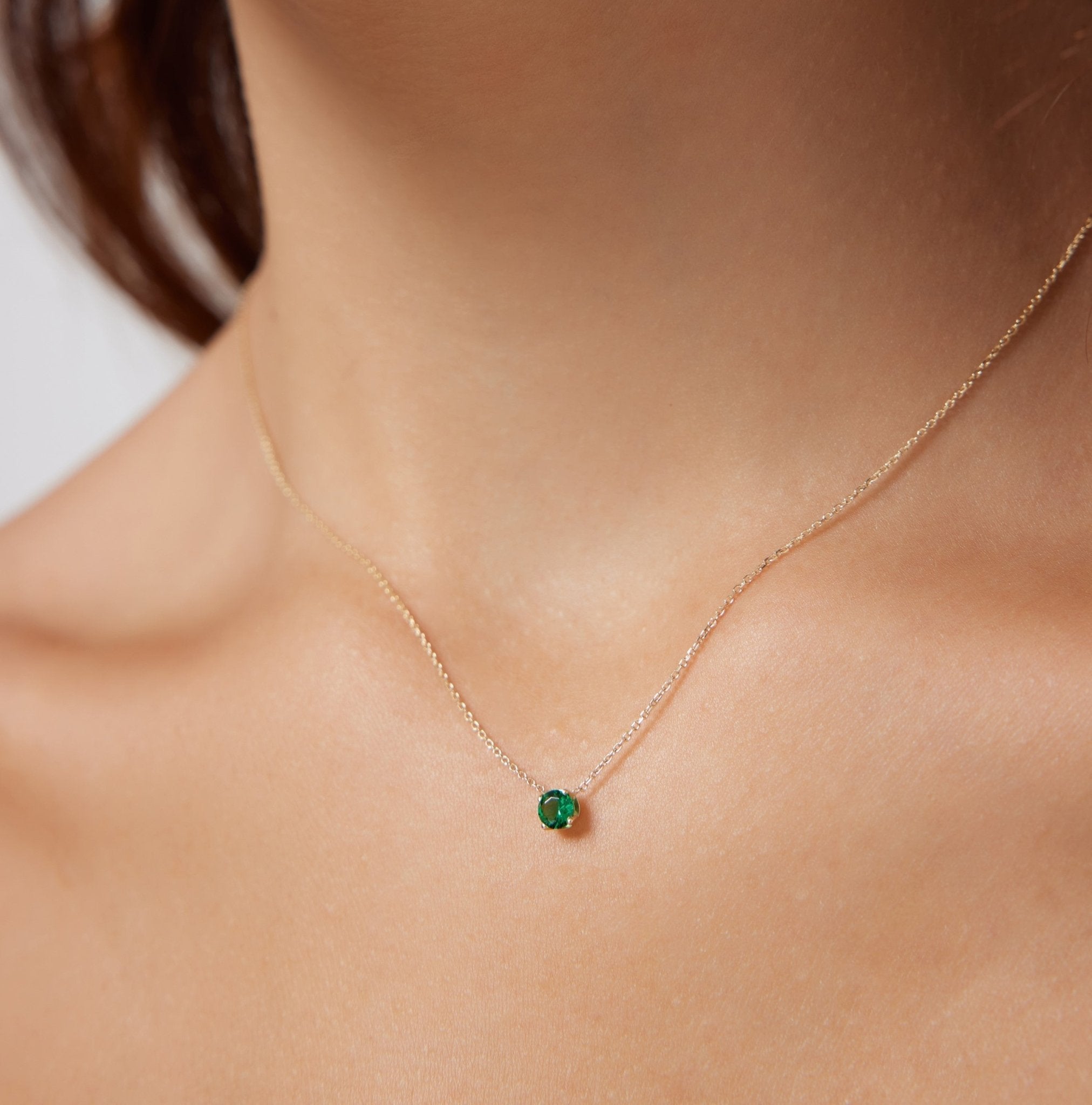 14K white gold minimalist necklace featuring a 5mm prong set emerald, perfect for everyday wear, May birthstone jewelry.