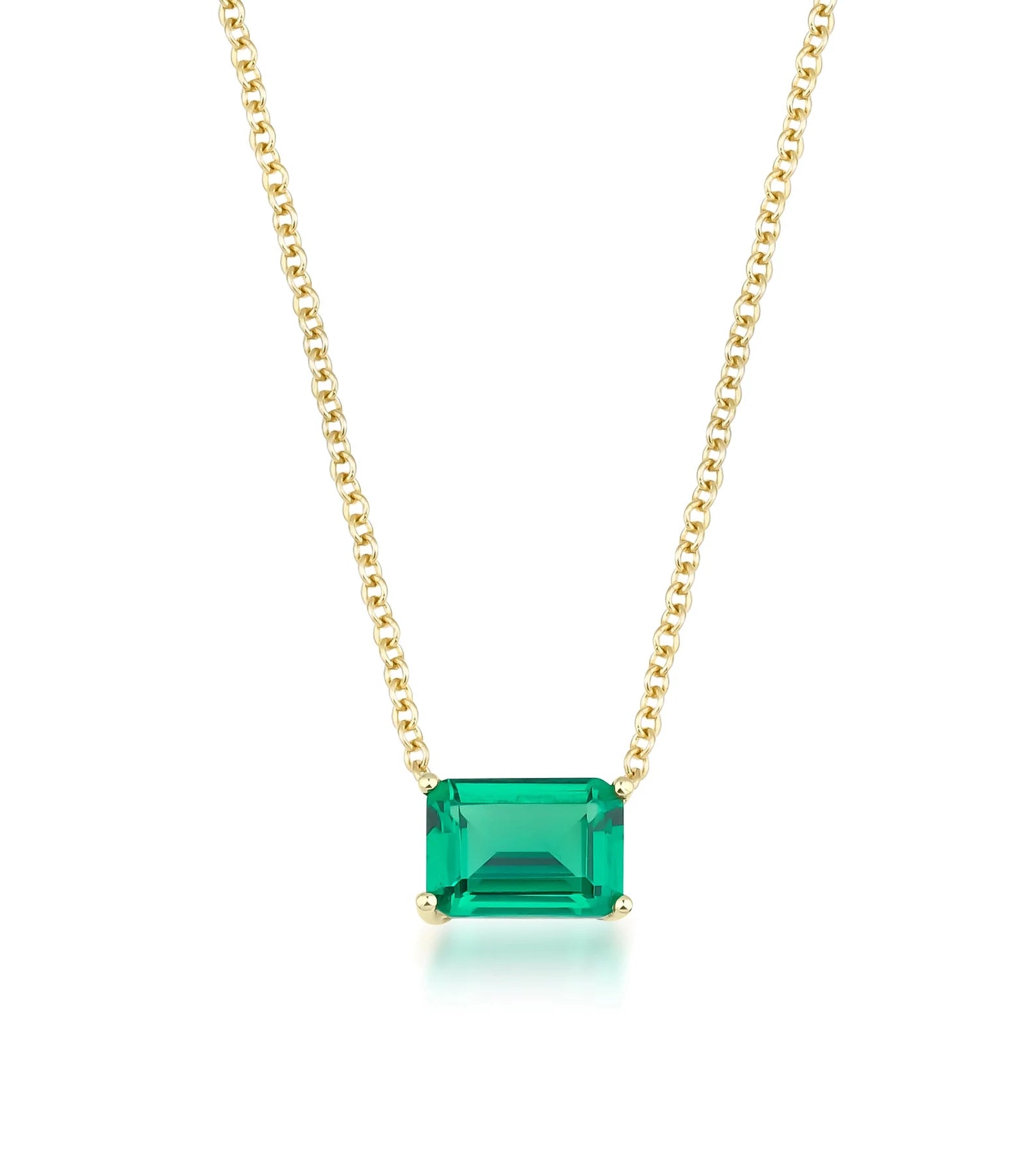 14K yellow gold emerald cut solitaire emerald necklace with 7x5mm pendant on a delicate chain.
