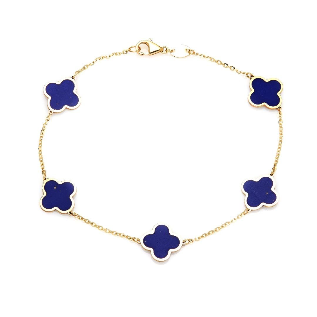 14K yellow gold bracelet with lapis four leaf clover design, perfect for everyday elegance.