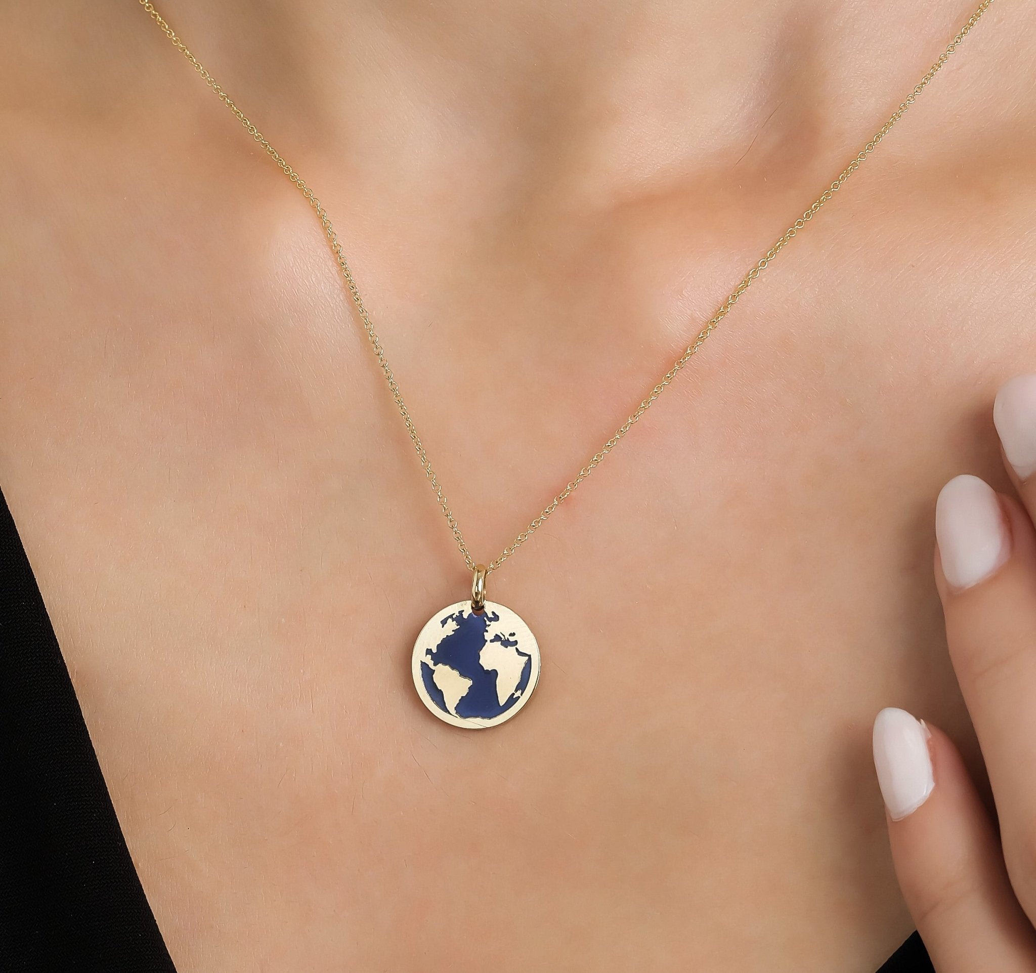 14K yellow gold lapis world map necklace featuring a delicate globe pendant, perfect for everyday wear.