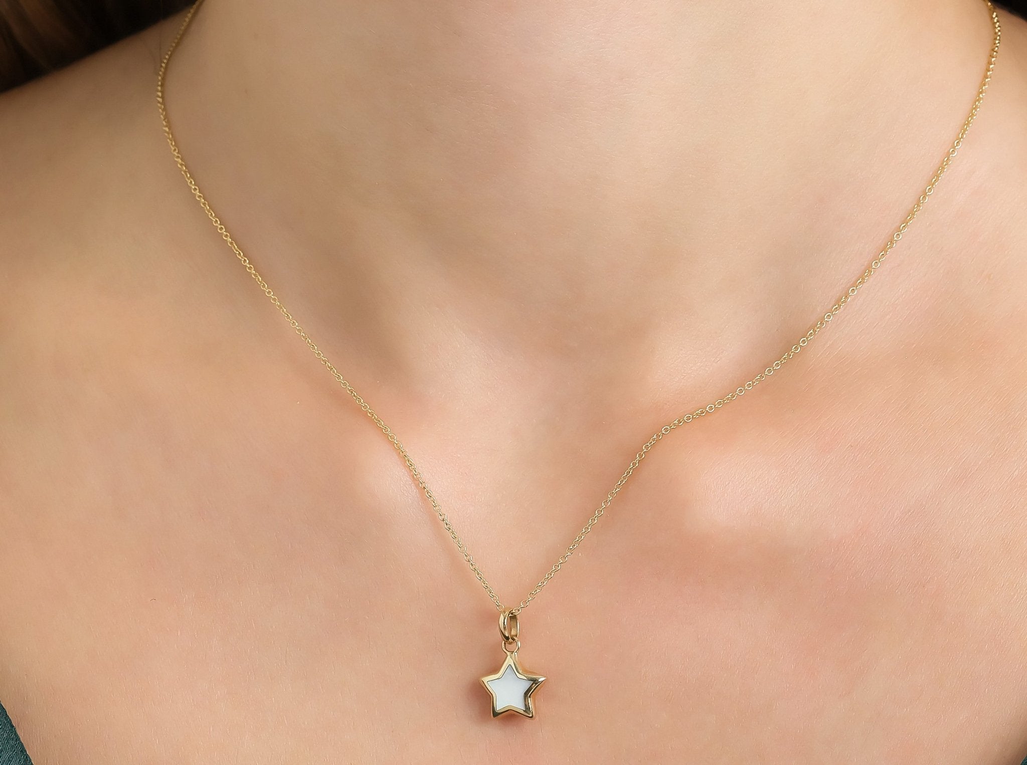 14K yellow gold minimalist star necklace featuring a natural pearl star pendant, perfect for everyday elegance.