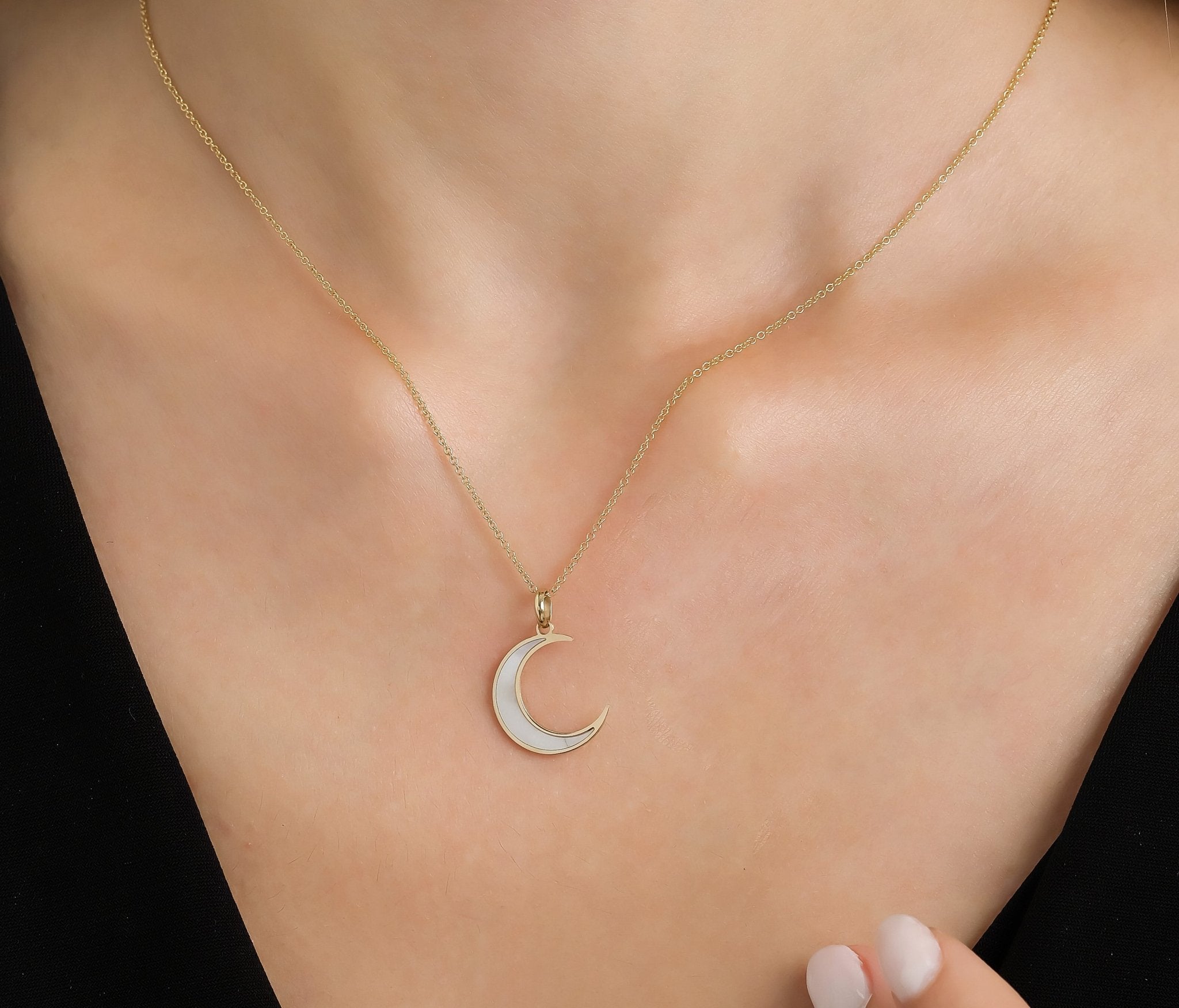 14K yellow gold crescent moon necklace with natural mother of pearl pendant, perfect for everyday wear.