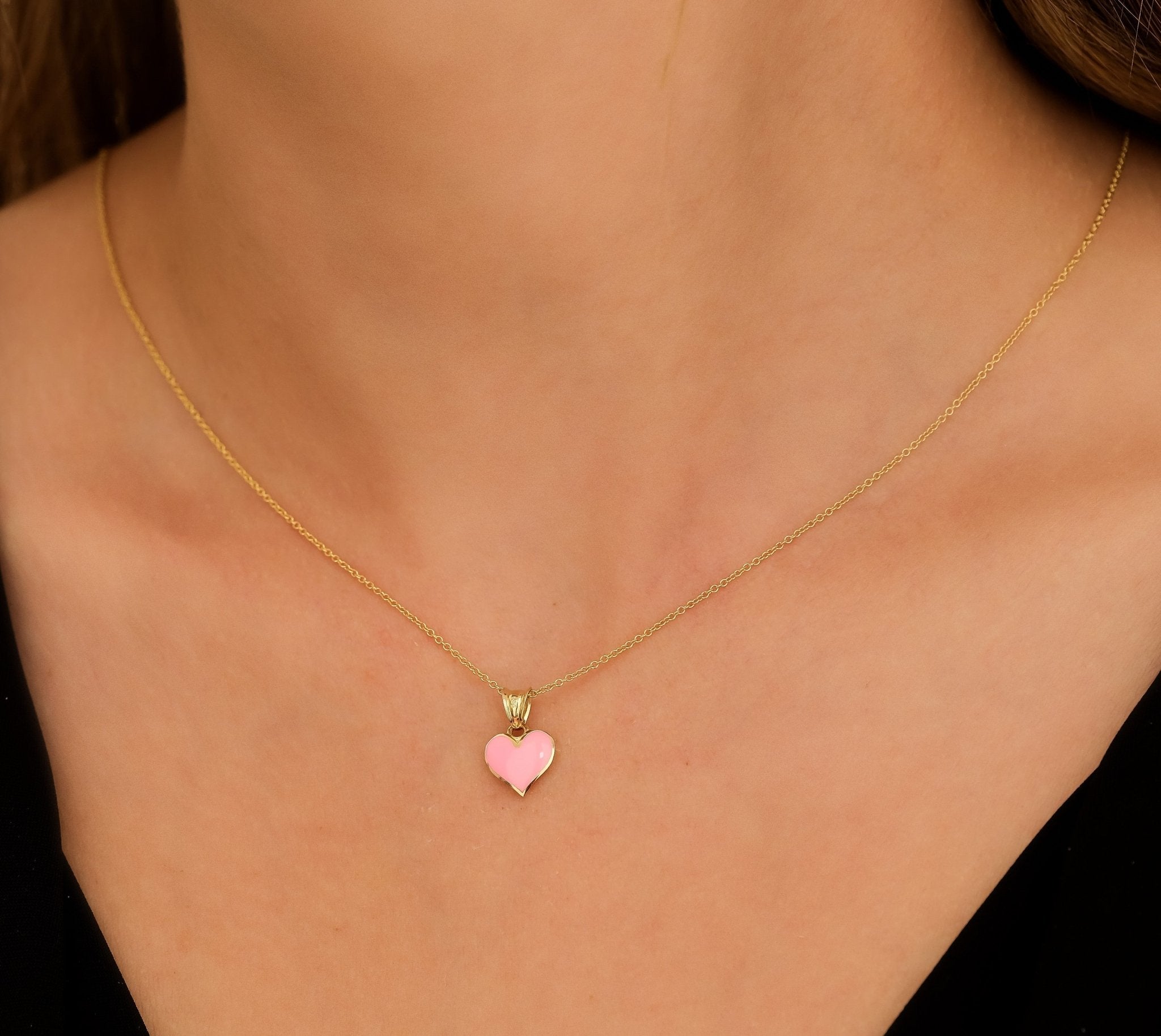 14K yellow gold necklace featuring a pink enamel heart pendant, perfect for everyday wear in a gift box.