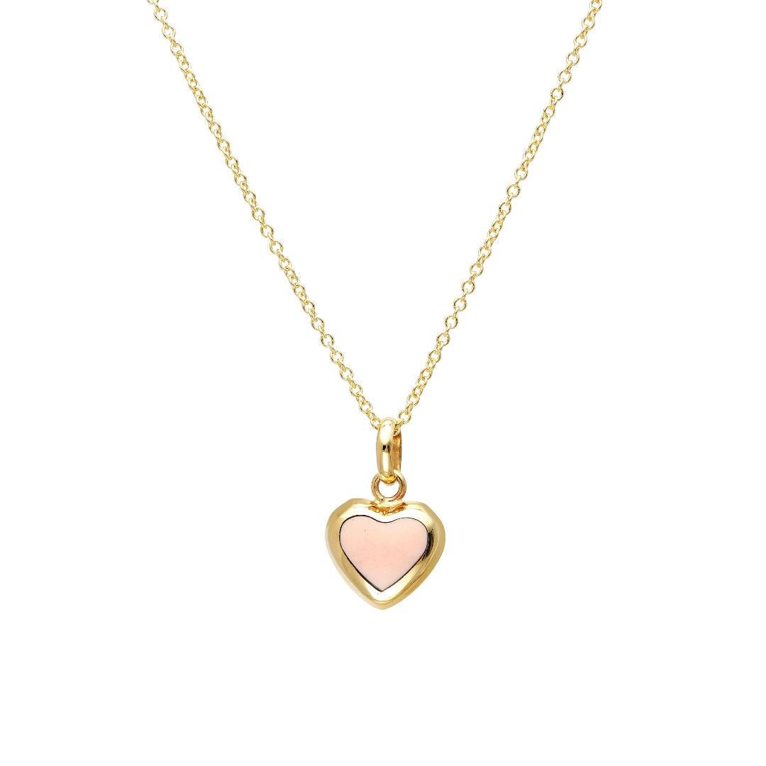 14K yellow gold necklace with pink puffed heart pendant, delicate design perfect for everyday wear.