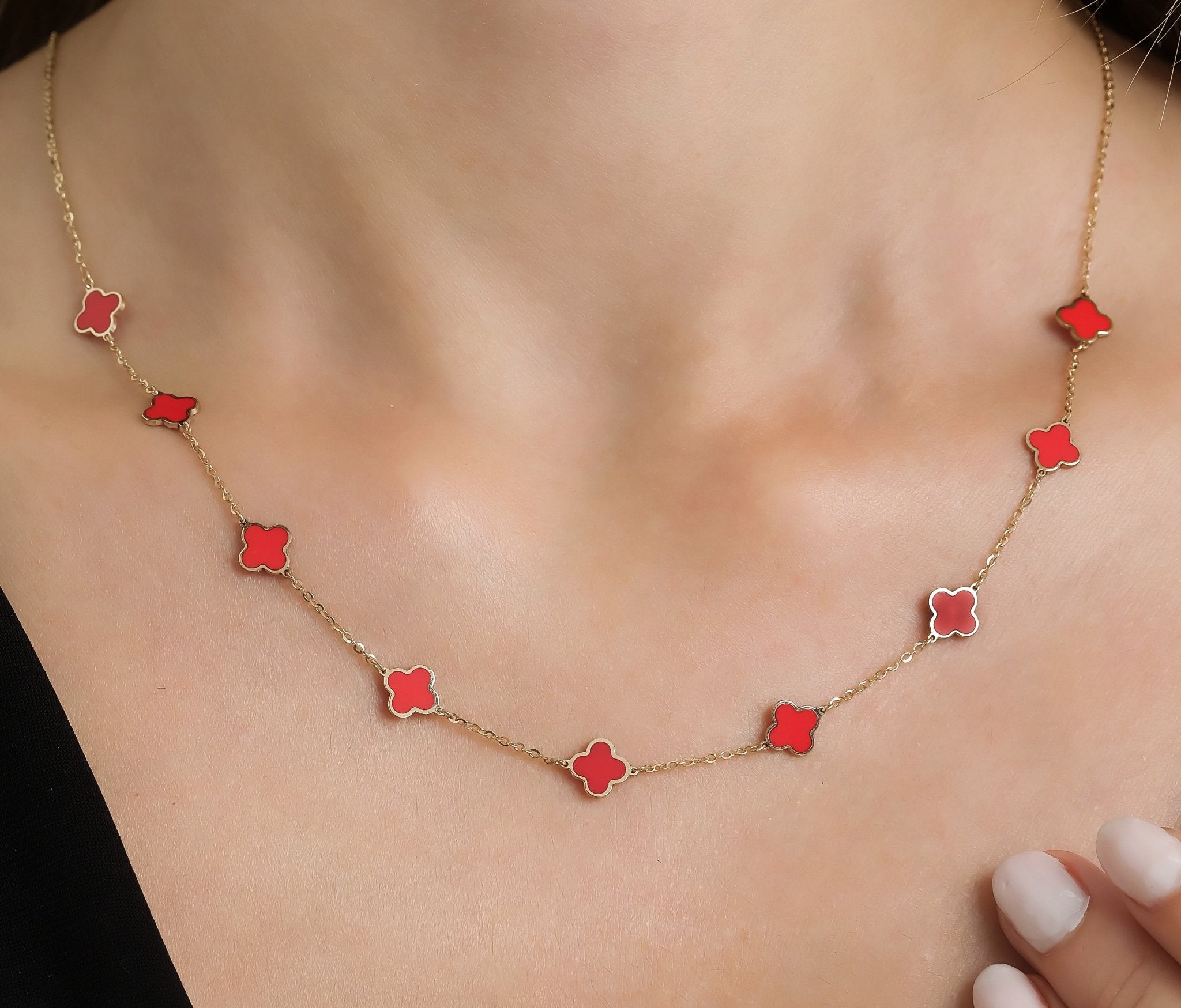 14K solid yellow gold and red coral four leaf clover station necklace worn, 16-17.5 inches length, gift-ready.