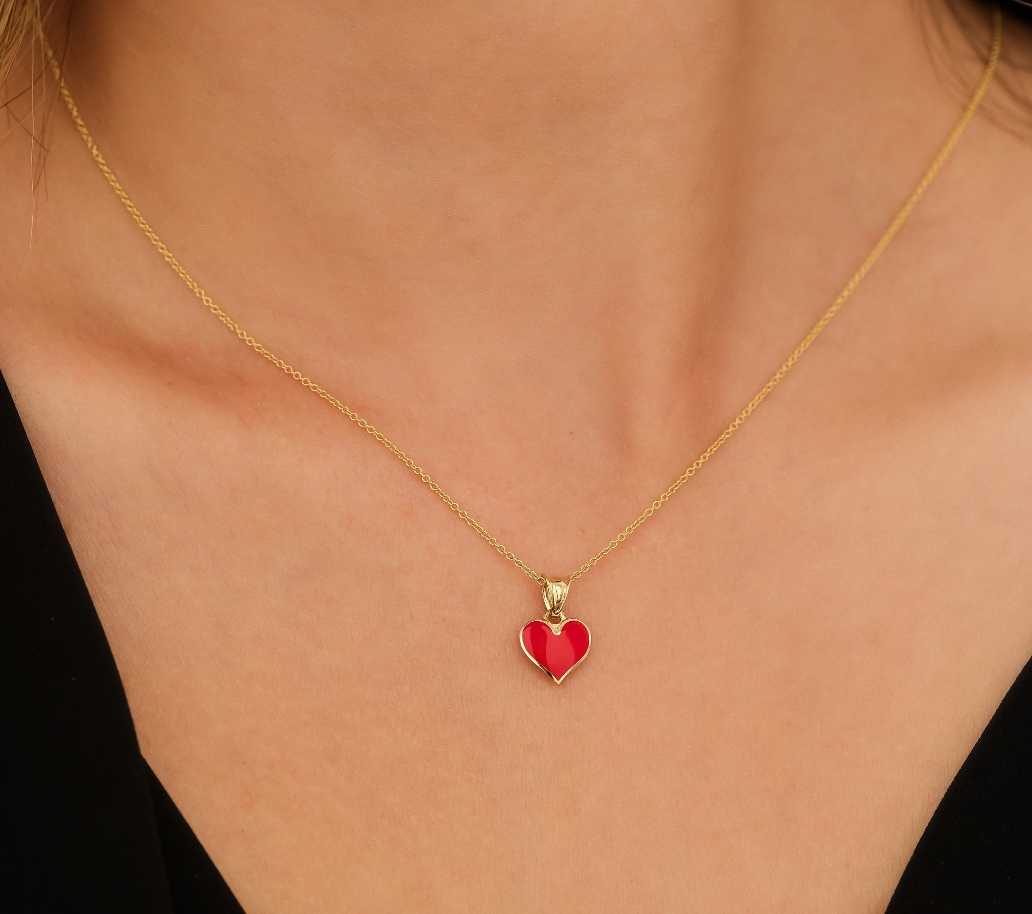 14K yellow gold necklace with red enamel heart pendant, perfect for everyday wear and comes in a gift box.
