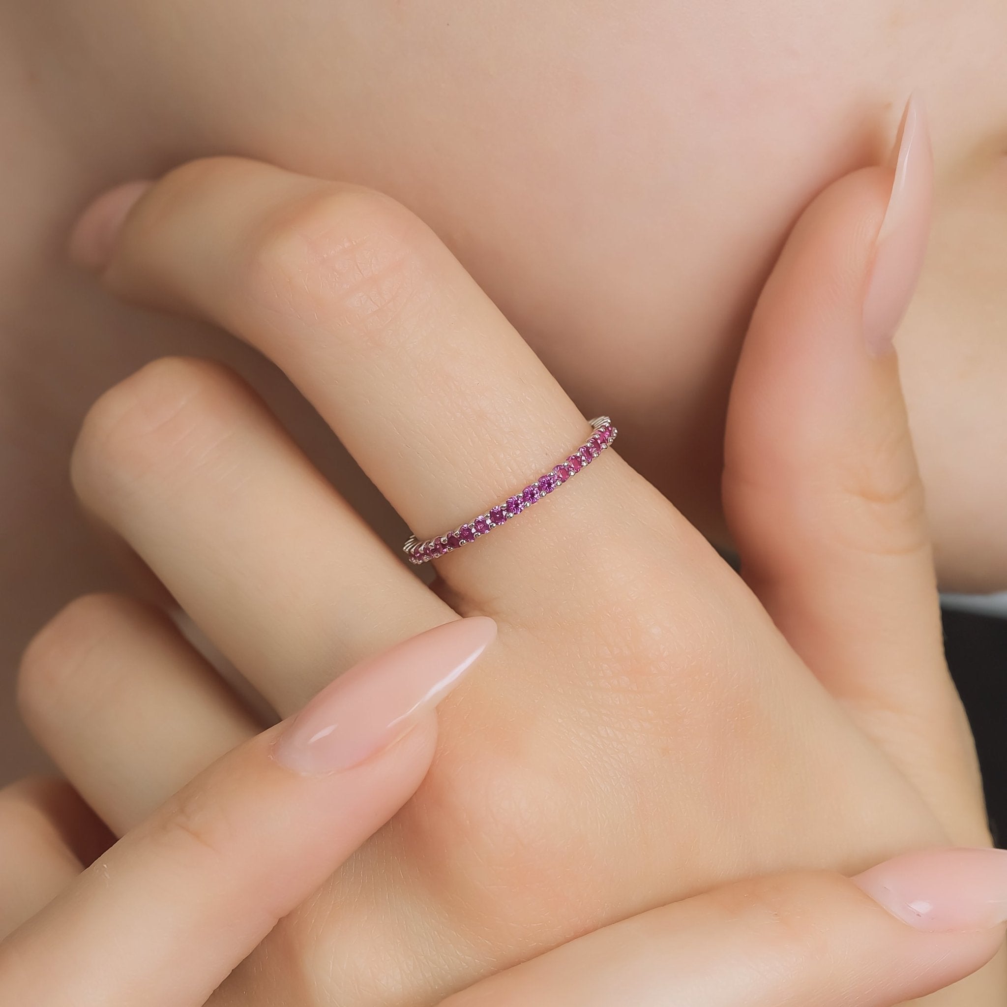 14K yellow gold full eternity ruby wedding band featuring a prong setting and 39 lab-created rubies, perfect for stacking.