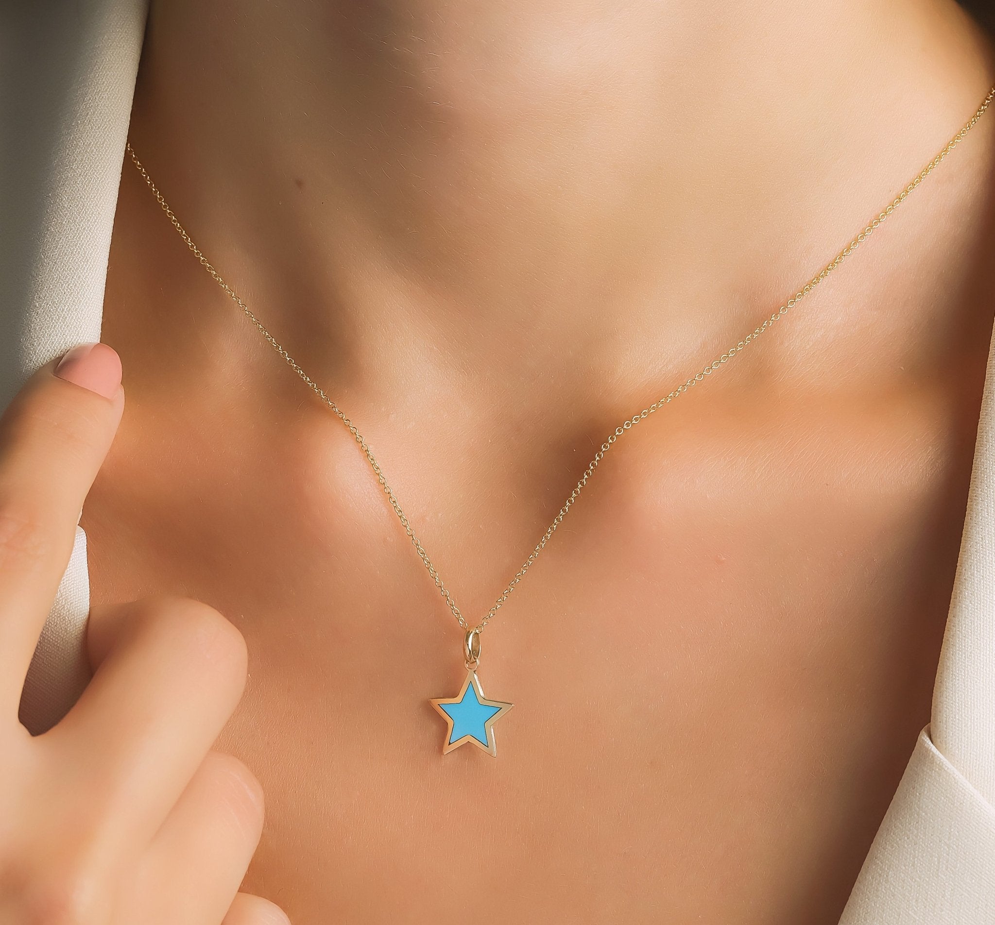 14K yellow gold necklace featuring a dainty turquoise star pendant, perfect for everyday elegance.