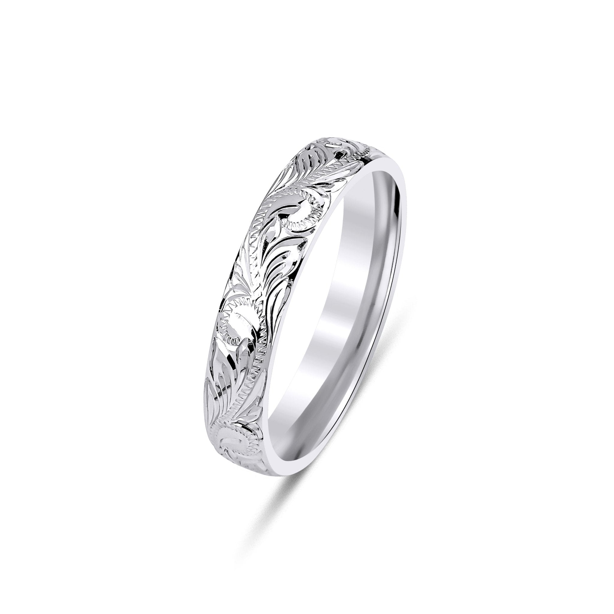 4mm hand engraved white gold wedding band with leaf motifs, shiny finish, comfort fit, made in New York, available in various metals.