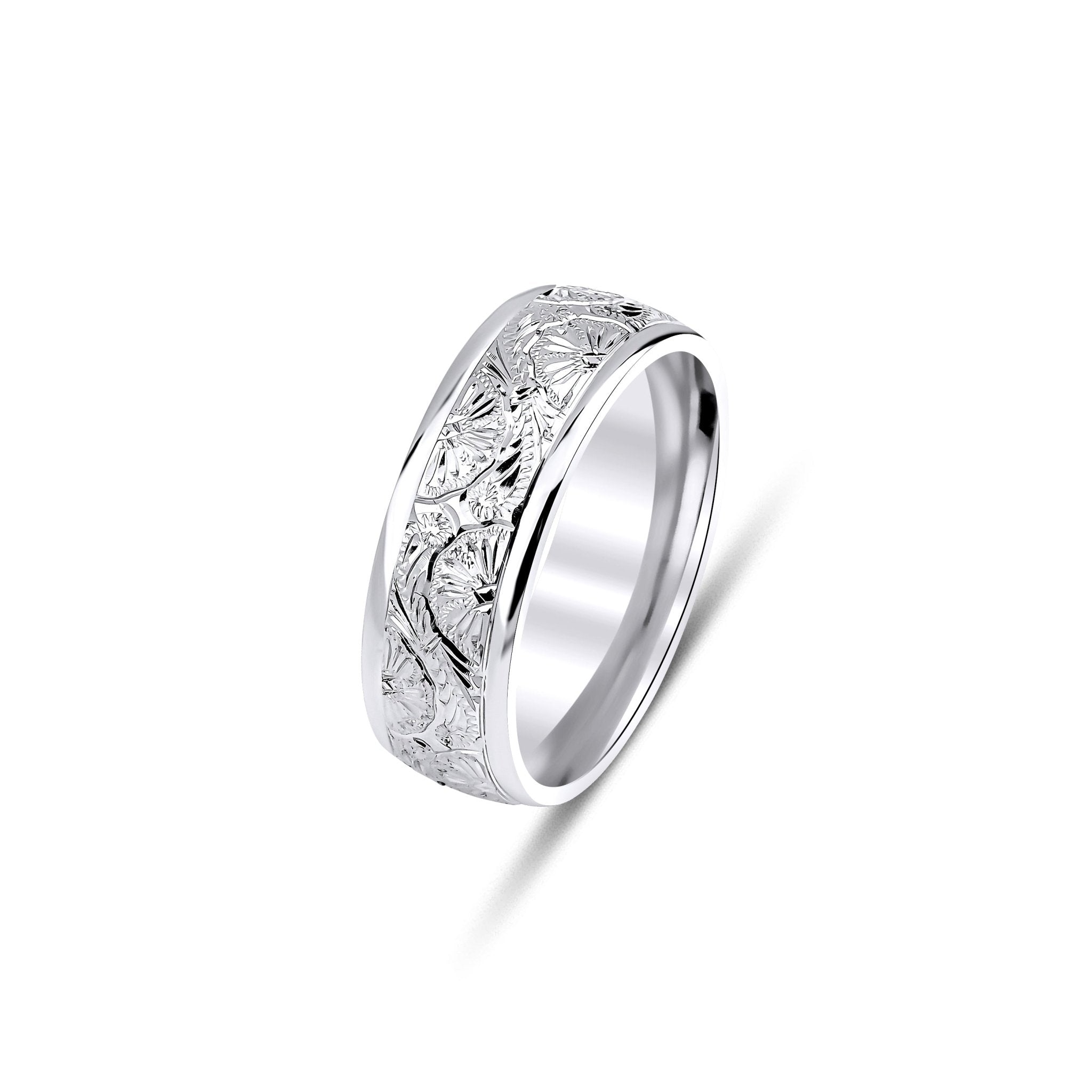 Hand engraved 7mm white gold wedding band featuring a leaf motif and shiny finish, comfort fitted, available in multiple options.