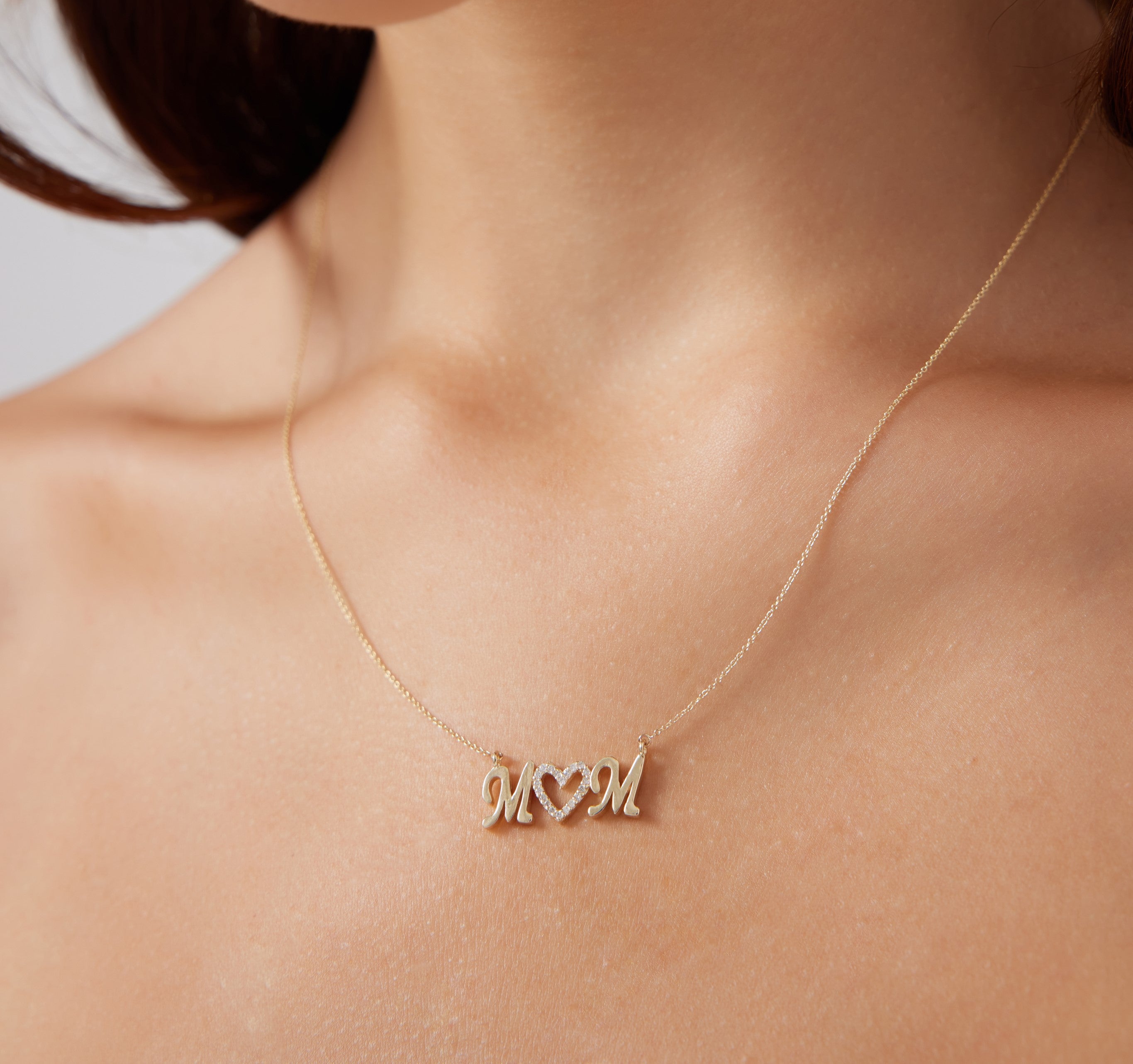 14K yellow gold mom necklace with heart pendant, perfect Mother's Day gift for special occasions.