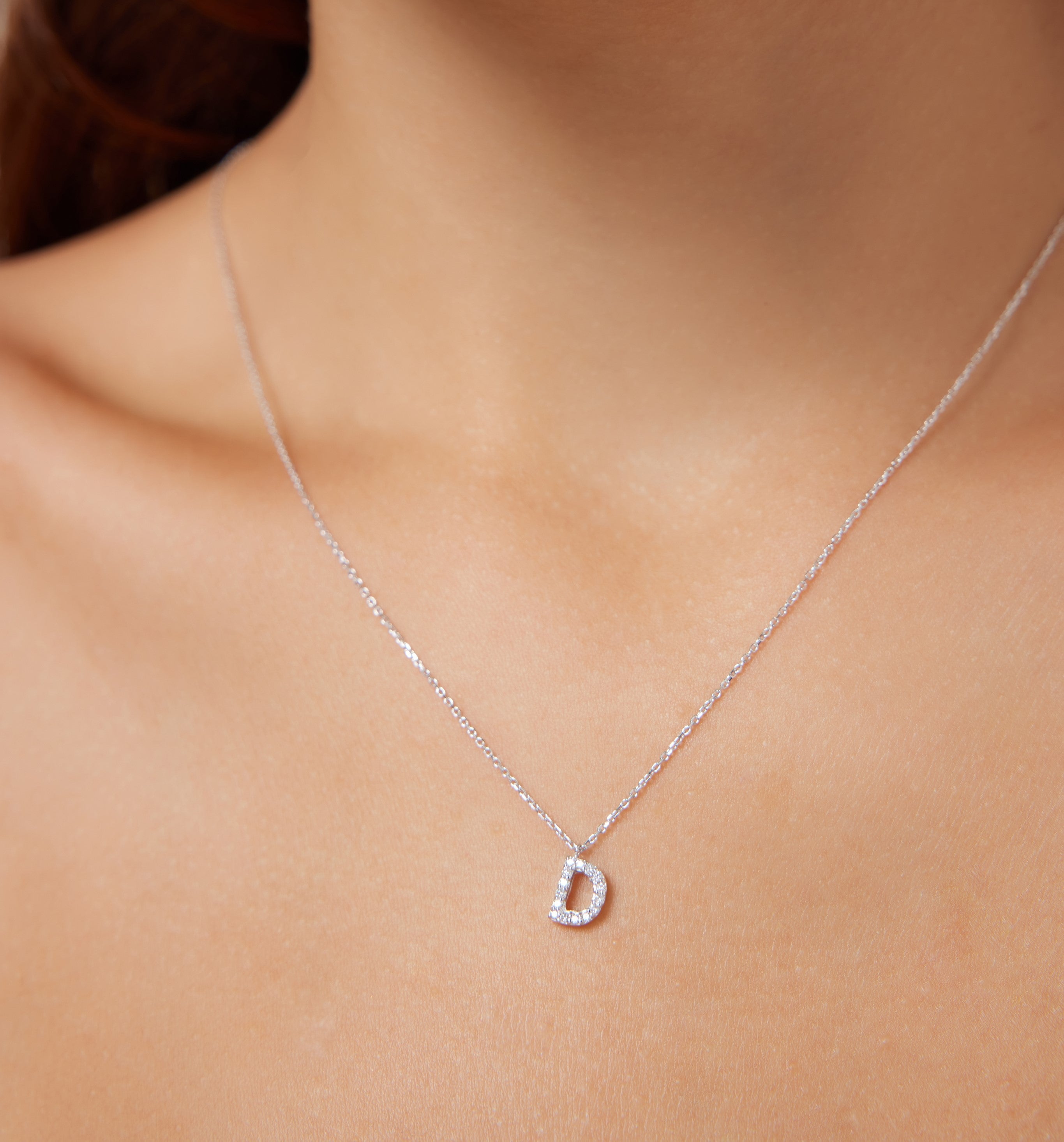 14K white gold diamond initial necklace featuring letter D, 16 inch chain, with sparkling diamonds.