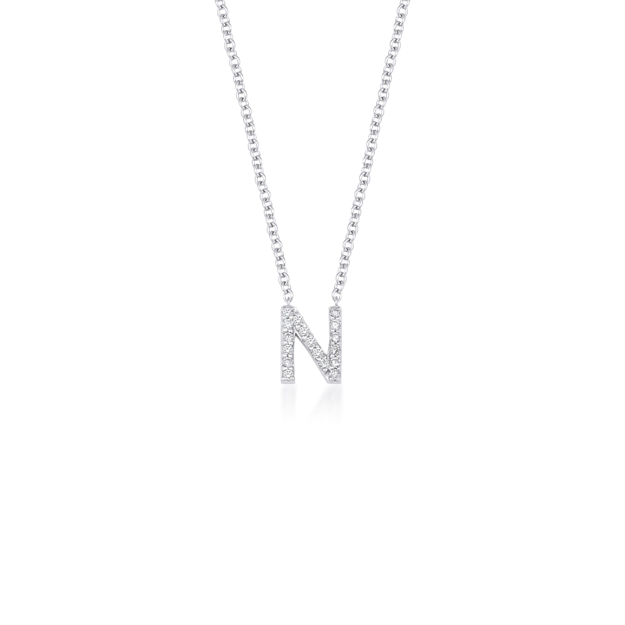 14K white gold diamond initial necklace featuring the letter N, 16 sparkling diamonds, dainty design, 16 inches in length.