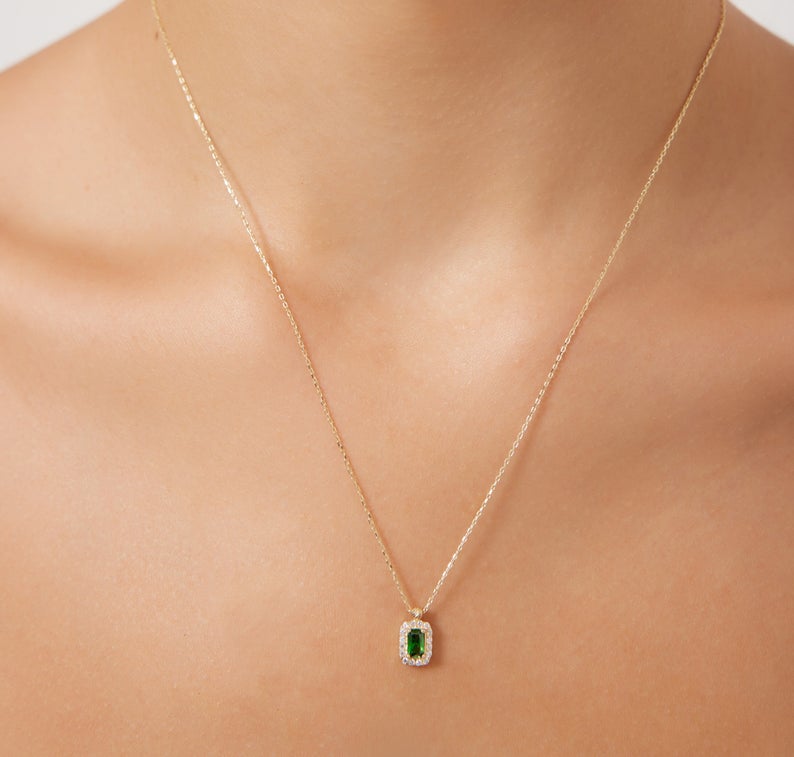 14K yellow gold emerald cut solitaire necklace with lab-created emerald and CZ, perfect for everyday use.