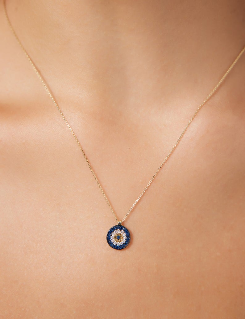 14K solid yellow gold minimalist round evil eye necklace featuring cz stones, perfect for everyday wear.