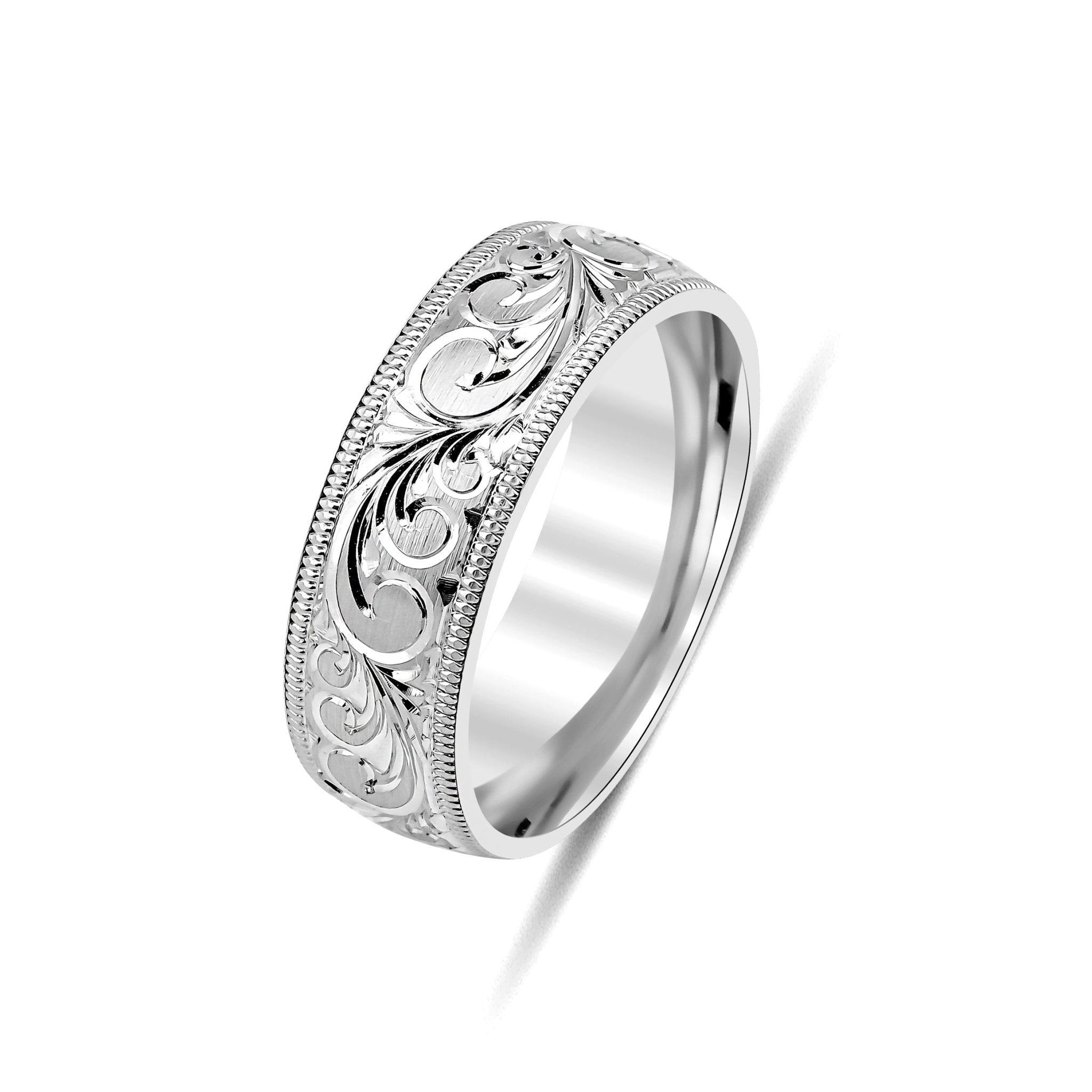 Hand engraved 10K white gold wedding ring with shiny leaf motifs and milgrain, 7mm comfort fit band.