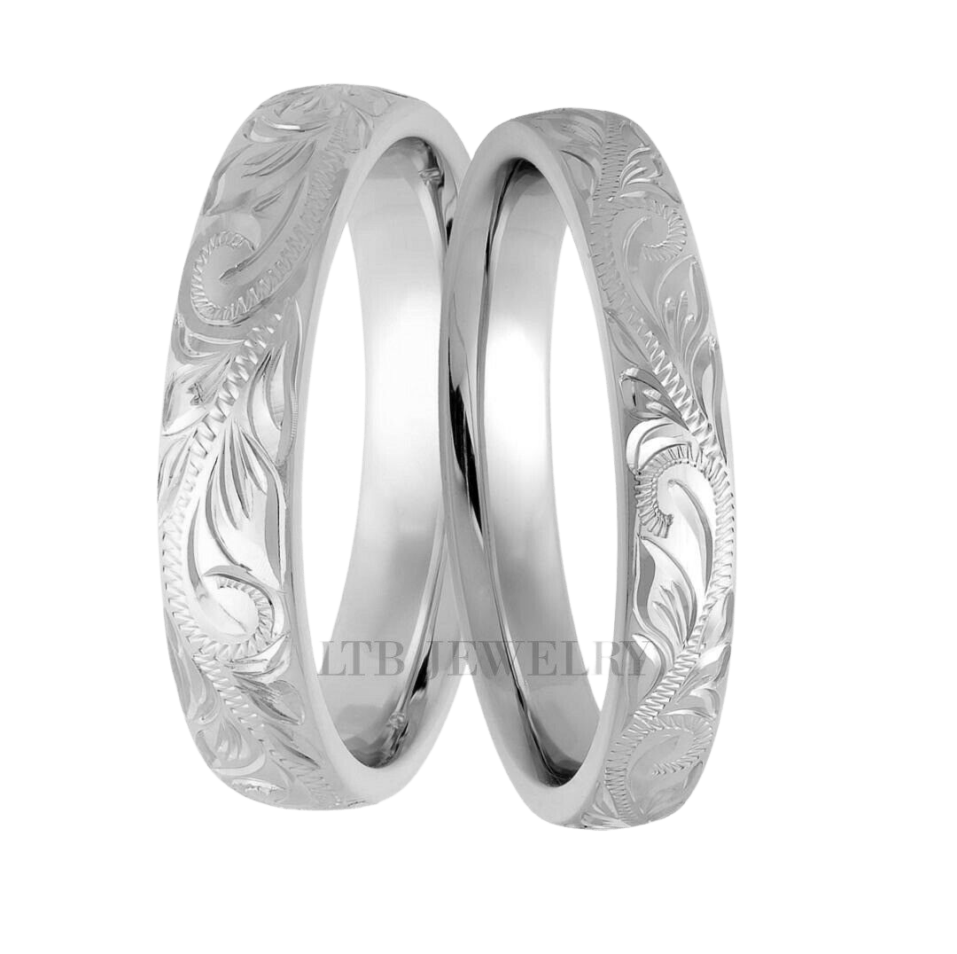 His and hers hand engraved platinum wedding bands, 4mm and 3mm wide, featuring a shiny finish and comfort fit.