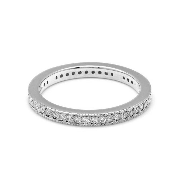 14K yellow gold full eternity diamond wedding band featuring 46 round diamonds with a shiny finish, size 4-8.