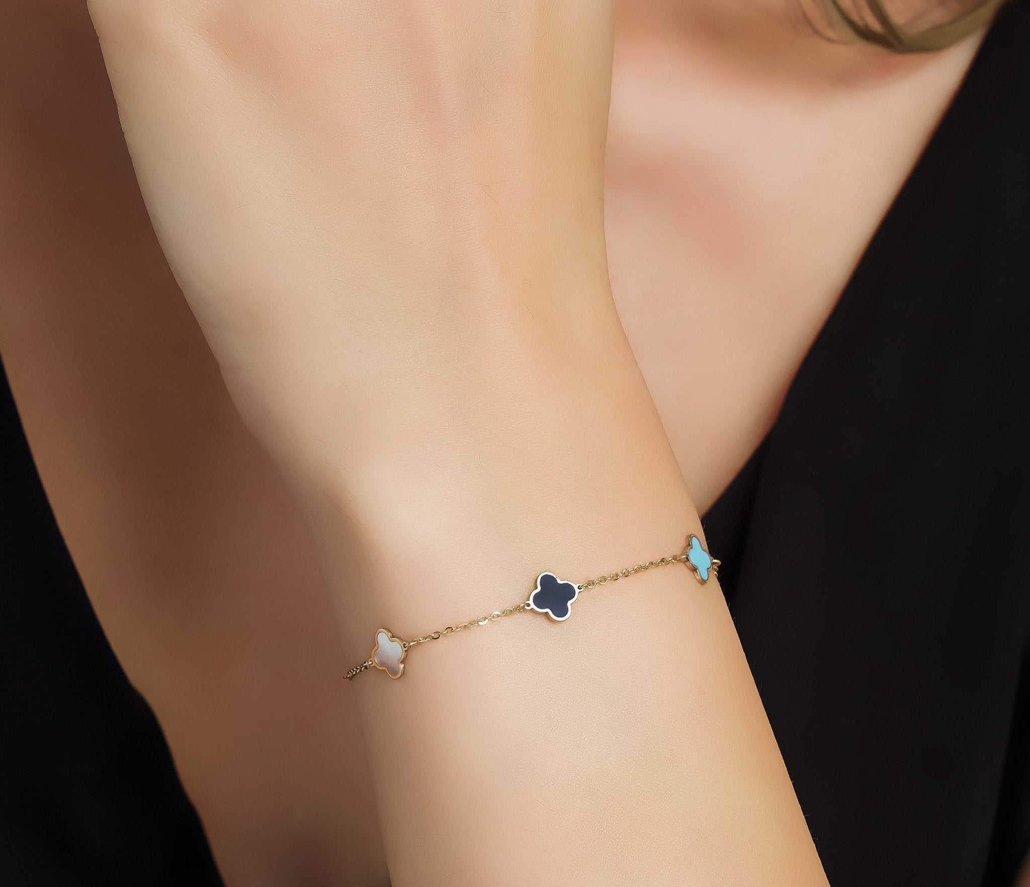 14K solid gold four leaf clover bracelet with mother of pearl and turquoise, perfect for everyday wear.