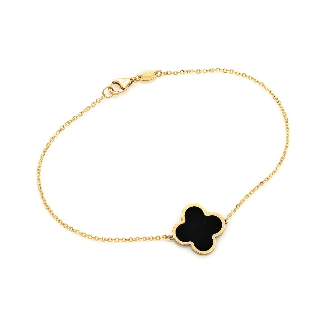 14K solid yellow gold four leaf clover bracelet with onyx charm, 7 inches long, featuring a thick chain and lobster claw clasp.