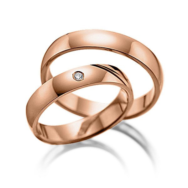 4mm solid rose gold wedding bands for him and her with a diamond, shiny finish, comfort fitted, available in various styles.