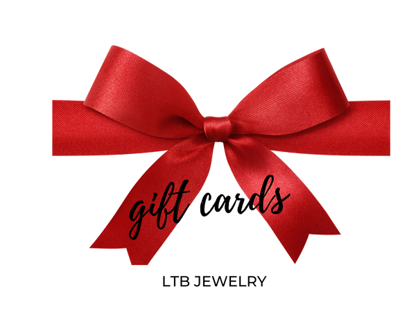 Elegant red gift bow with the word 'gifts' written on its ribbon, perfect for festive occasions.