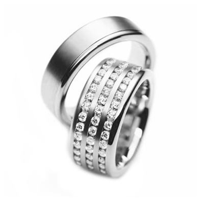Juego de alianzas de boda con diamantes para él y para ella