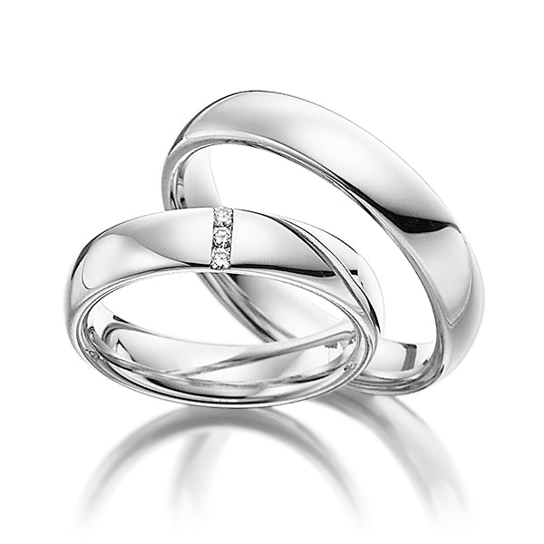 His and hers diamond wedding bands in 10K, 14K, 18K white gold with shiny finish and comfort fit.