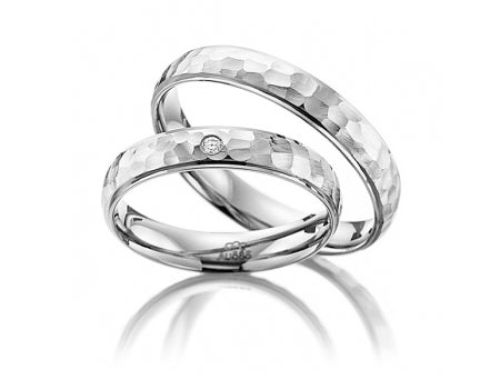 His and Hers hammered finish white gold wedding bands with diamond, showcasing unique style and comfort fit for couples.