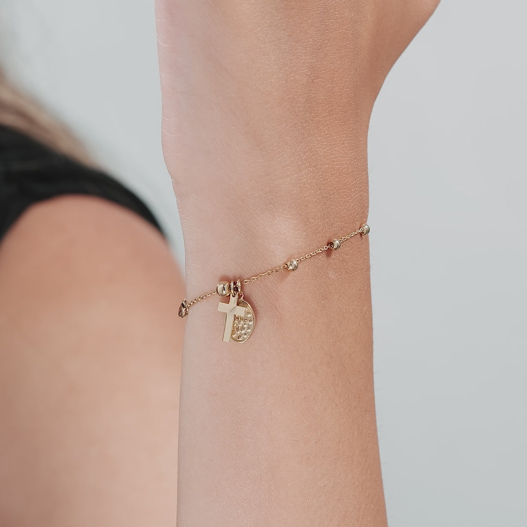 14K solid yellow gold Rosary bracelet featuring a delicate cross and Virgin Mary charm, perfect for everyday wear.