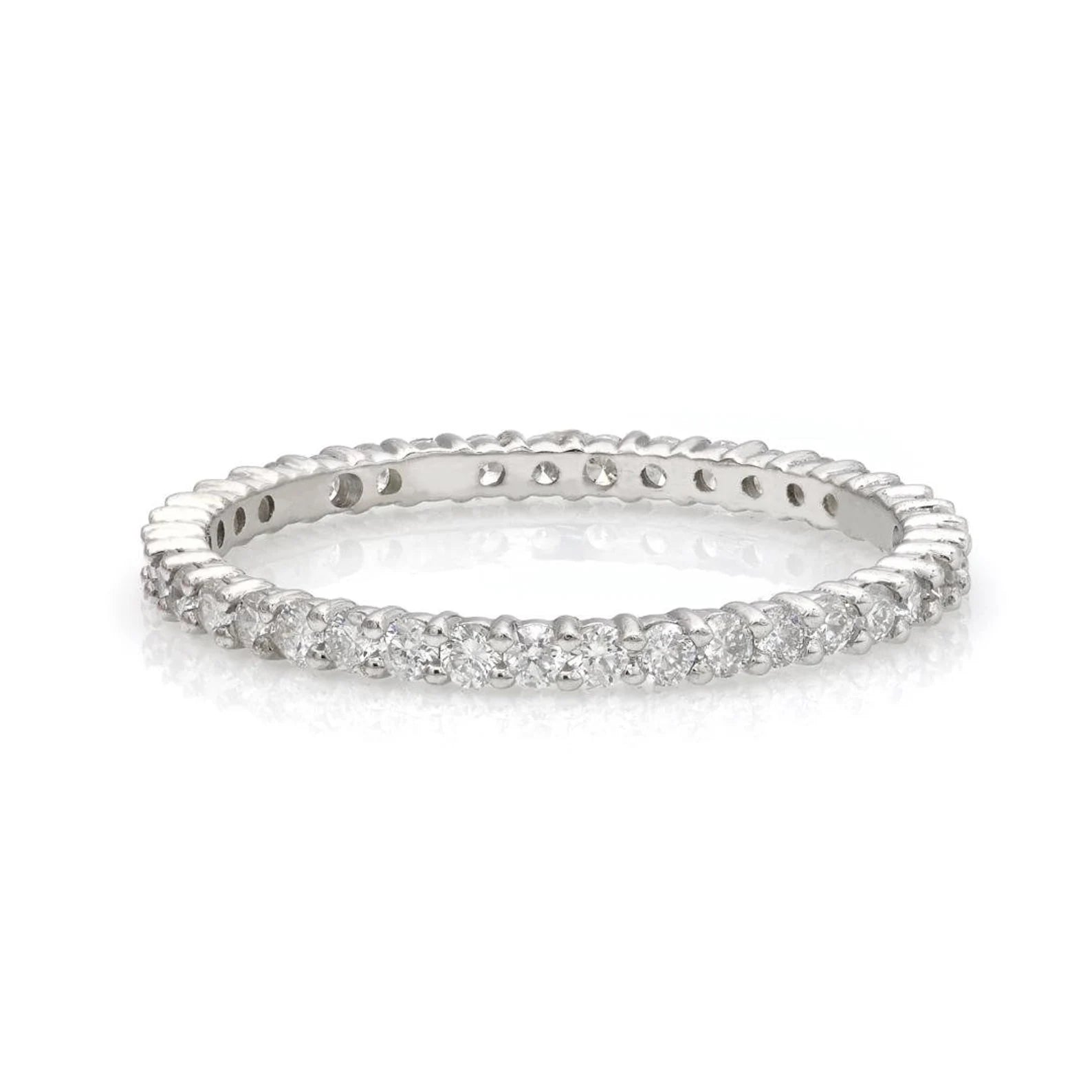 14K white gold full eternity diamond wedding ring featuring 34 round diamonds, 1.7mm width, 0.60 carats, shiny finish.