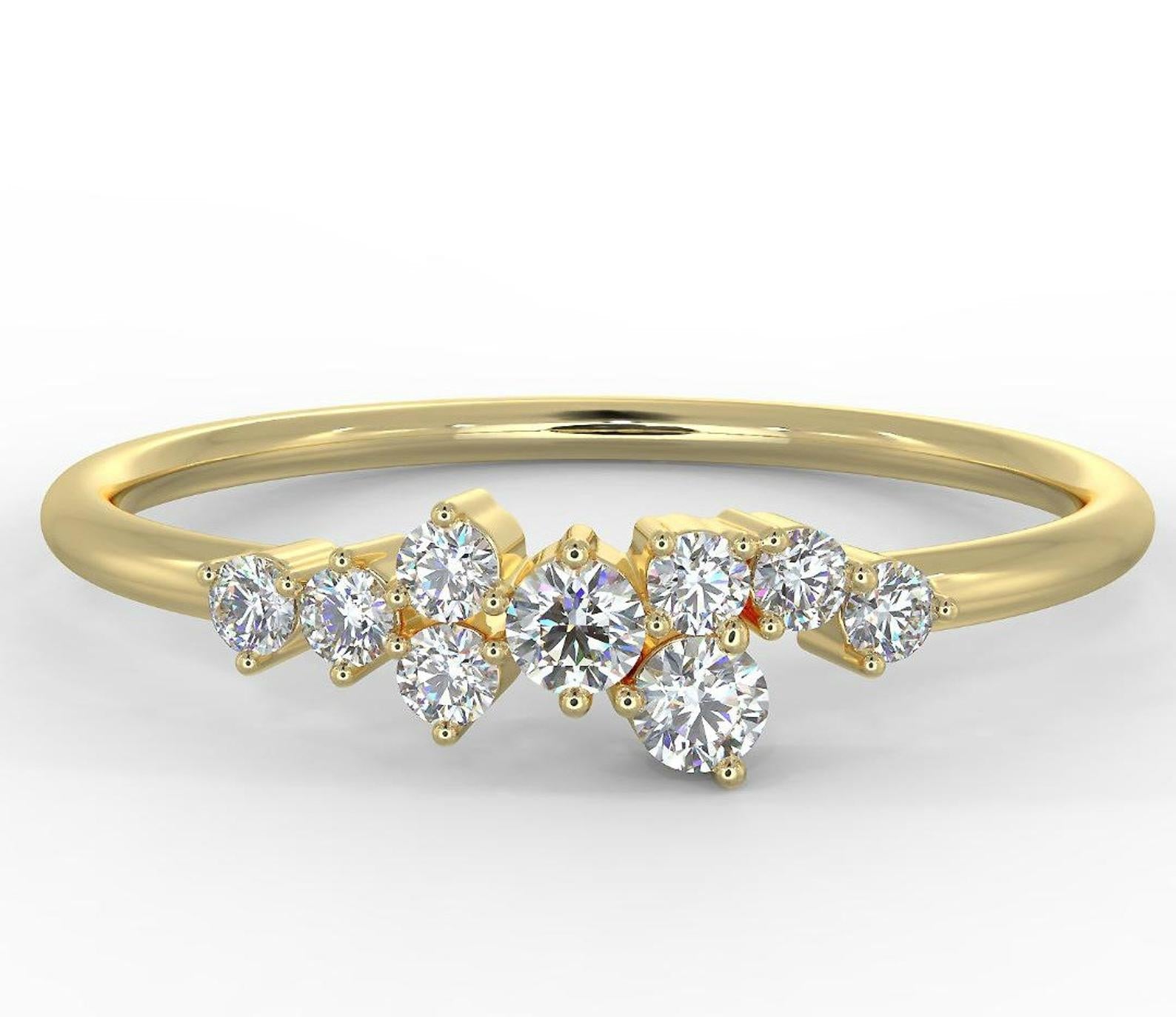 14K yellow gold minimalist diamond cluster ring featuring eight round diamonds in a delicate setting.